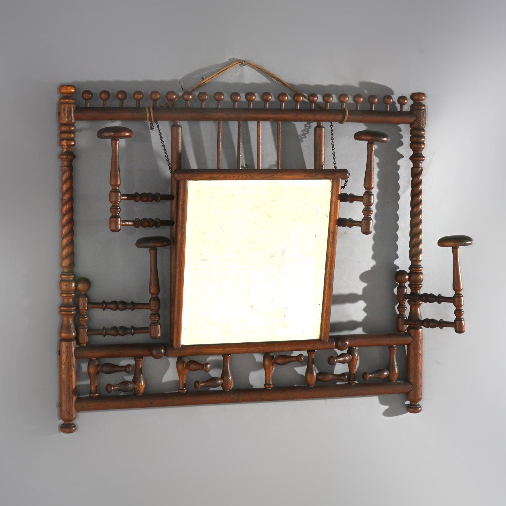 ***Inquire About Reduced In-House Delivery Rates - Reliable Professional Service & Fully Insured***

Antique Arts & Crafts Oak Rope Twist Stick & Ball Hat Rack with Mirror & Swing-Out Arms C1910

29 1/2