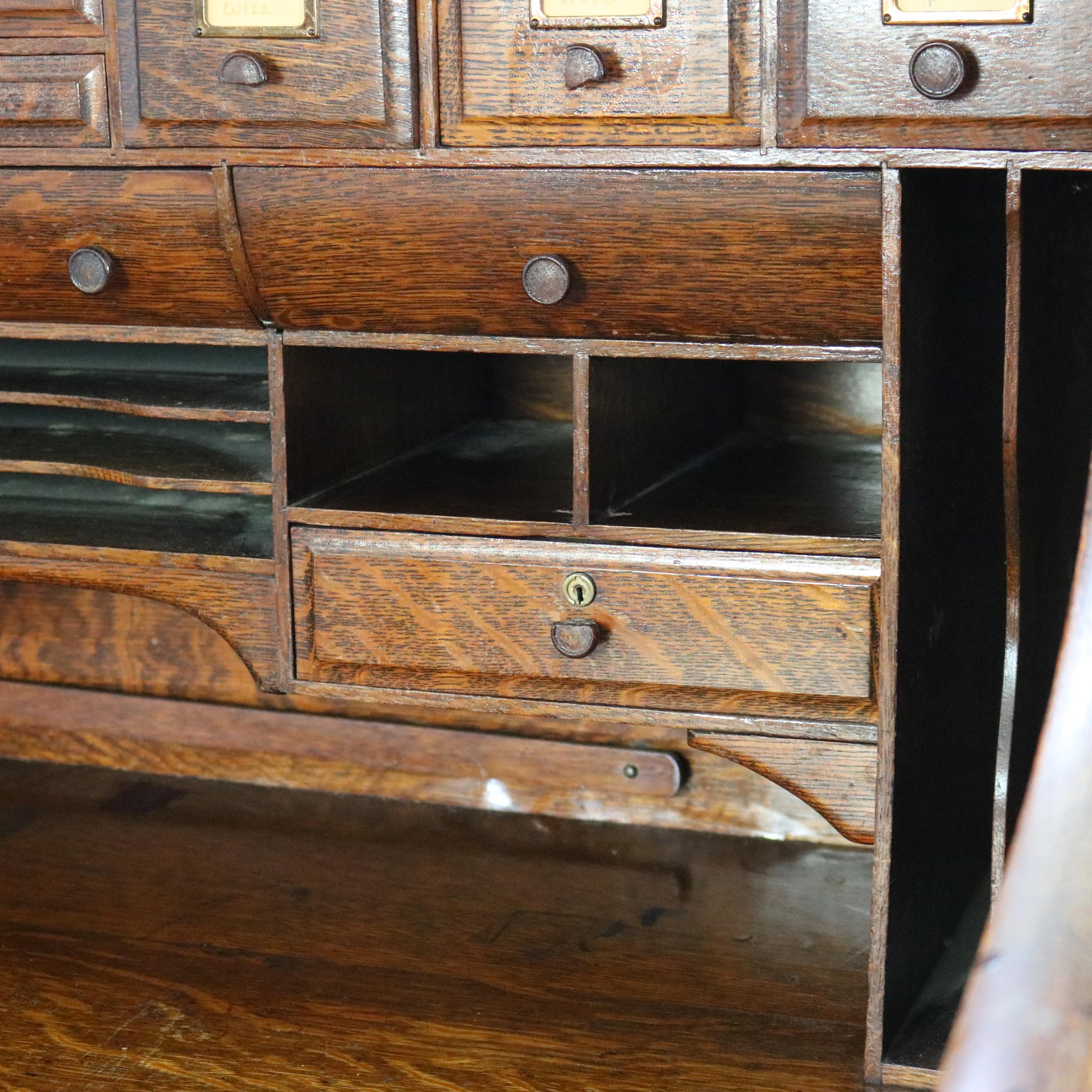 ***Reduced Delivery Rates - See Below or Click “Ask The Seller” to Request a Quote***

Antique Oak S-Roll Top Single Column Paneled Desk with Full Interior C1900

Measures - 50.75