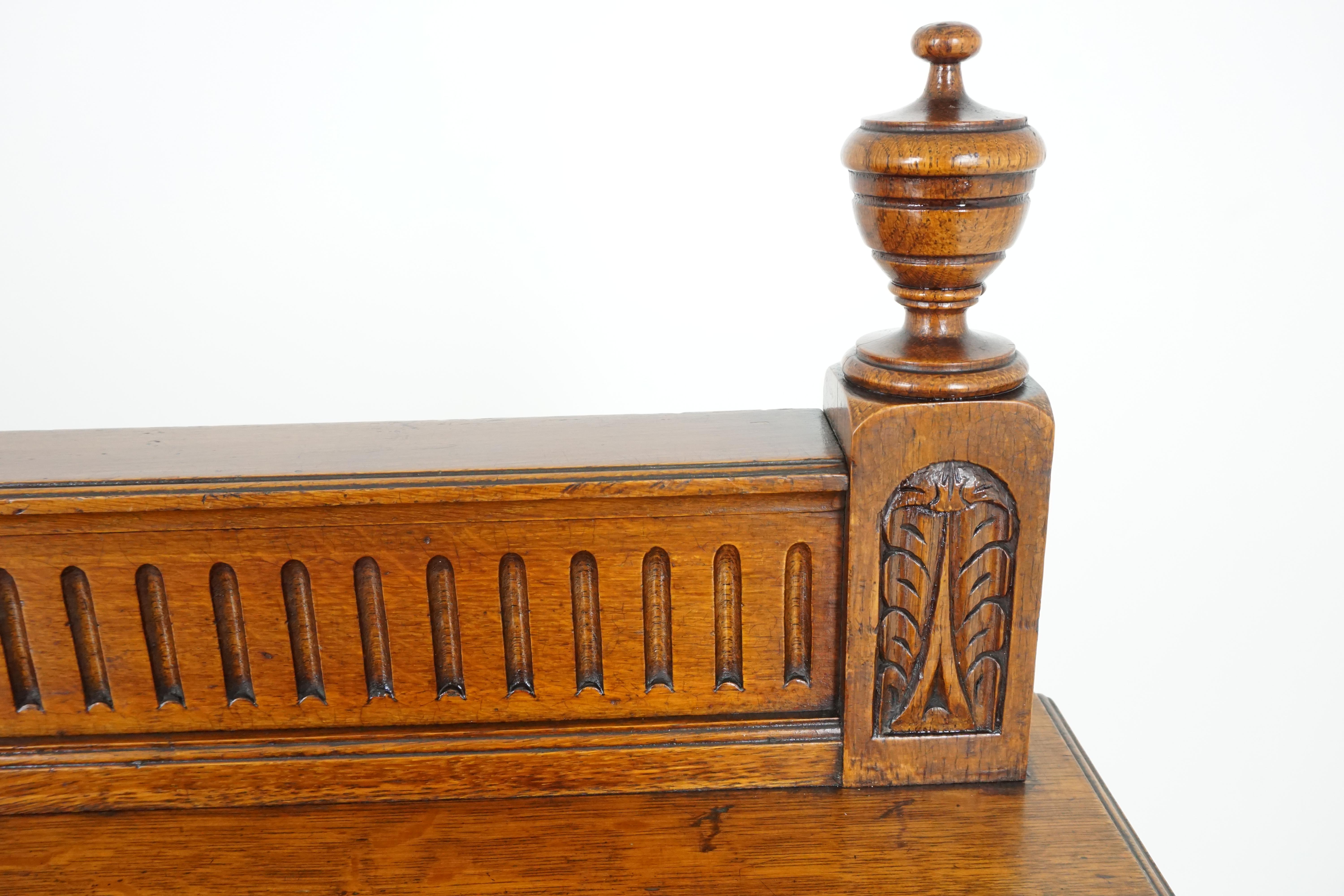 Antique Oak server sideboard, Victorian 3-tier sideboard buffet, antique furniture, Scotland 1880, B1849

Scotland 1880
Solid oak
Original finish
Rectangular top
Carved pediment to the back with finials
Two open shelves below
Turned supports