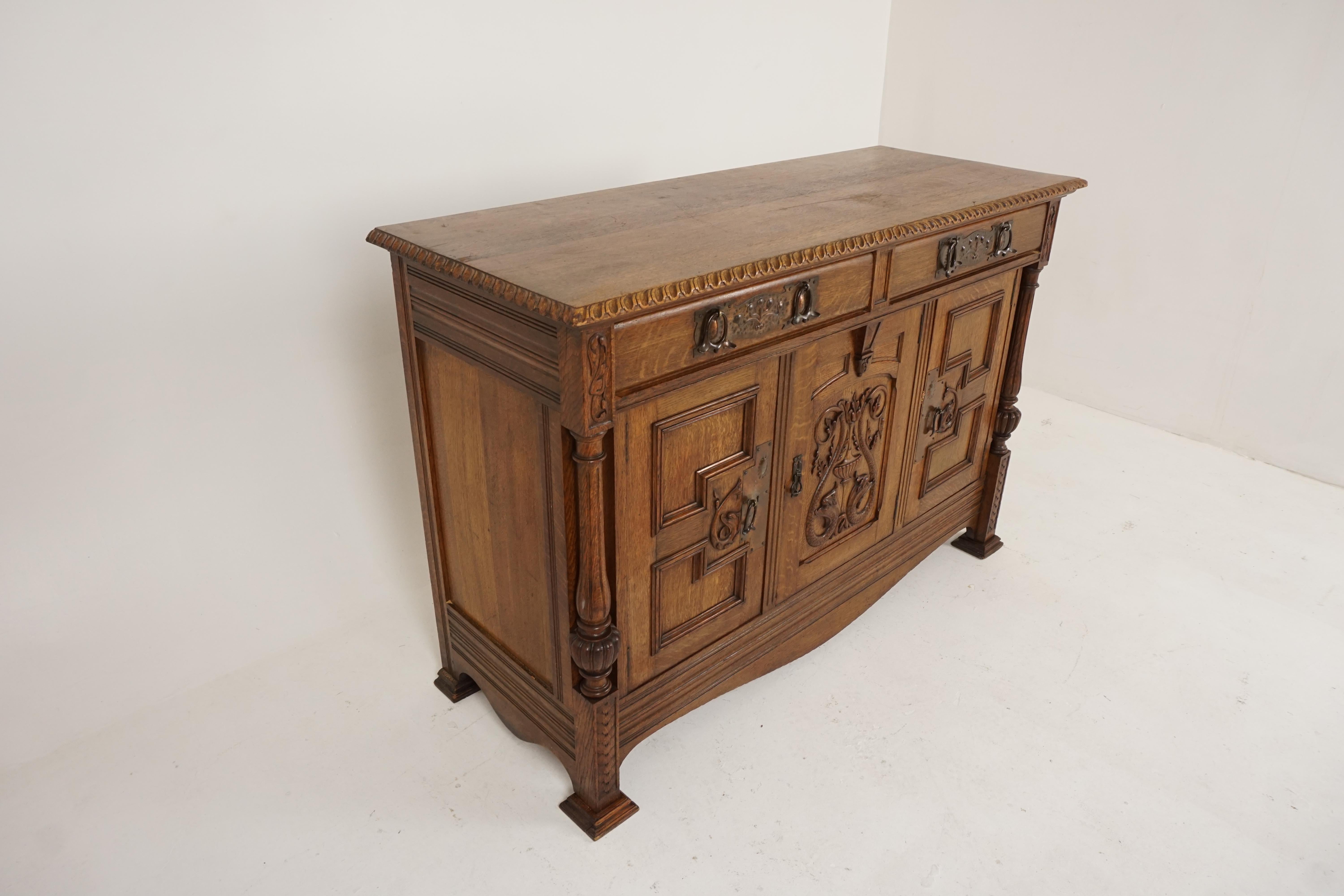 Antique oak sideboard, Arts & Crafts tiger oak sideboard buffet, chiffonier, Scotland 1910, B2470

Scotland, 1910
Solid oak
Original Finish
Rectangular top with carved Moulding
Pair of dovetailed drawers below
Copper hardware to the