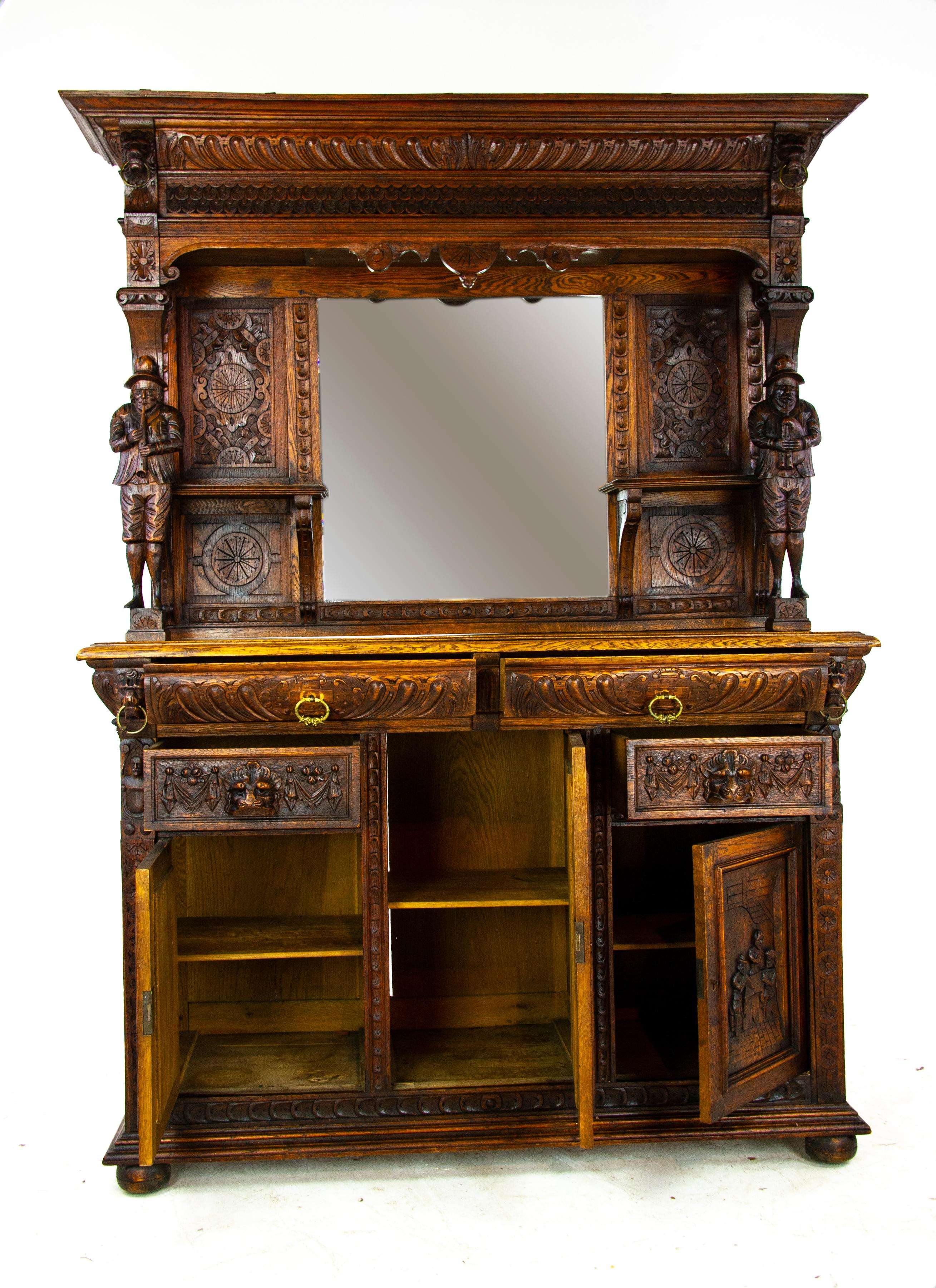 Antique oak sideboard, carved oak sideboard, Anglo-Flemish, antique furniture, Scotland, 1880, b1498

Scotland 1880
Solid oak construction with original finish
Has a projecting carved moulded cornice over central mirror
Flanked by carved panels