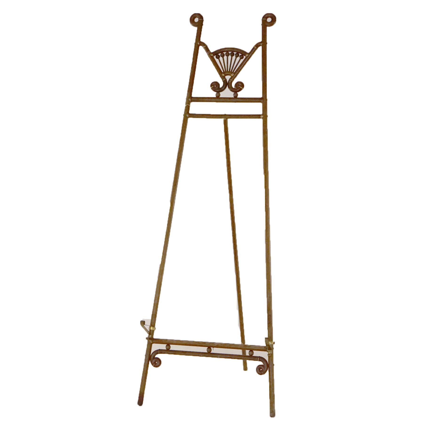 An antique art display easel offers oak construction with stylized fan crest, c1890

Measures - 65