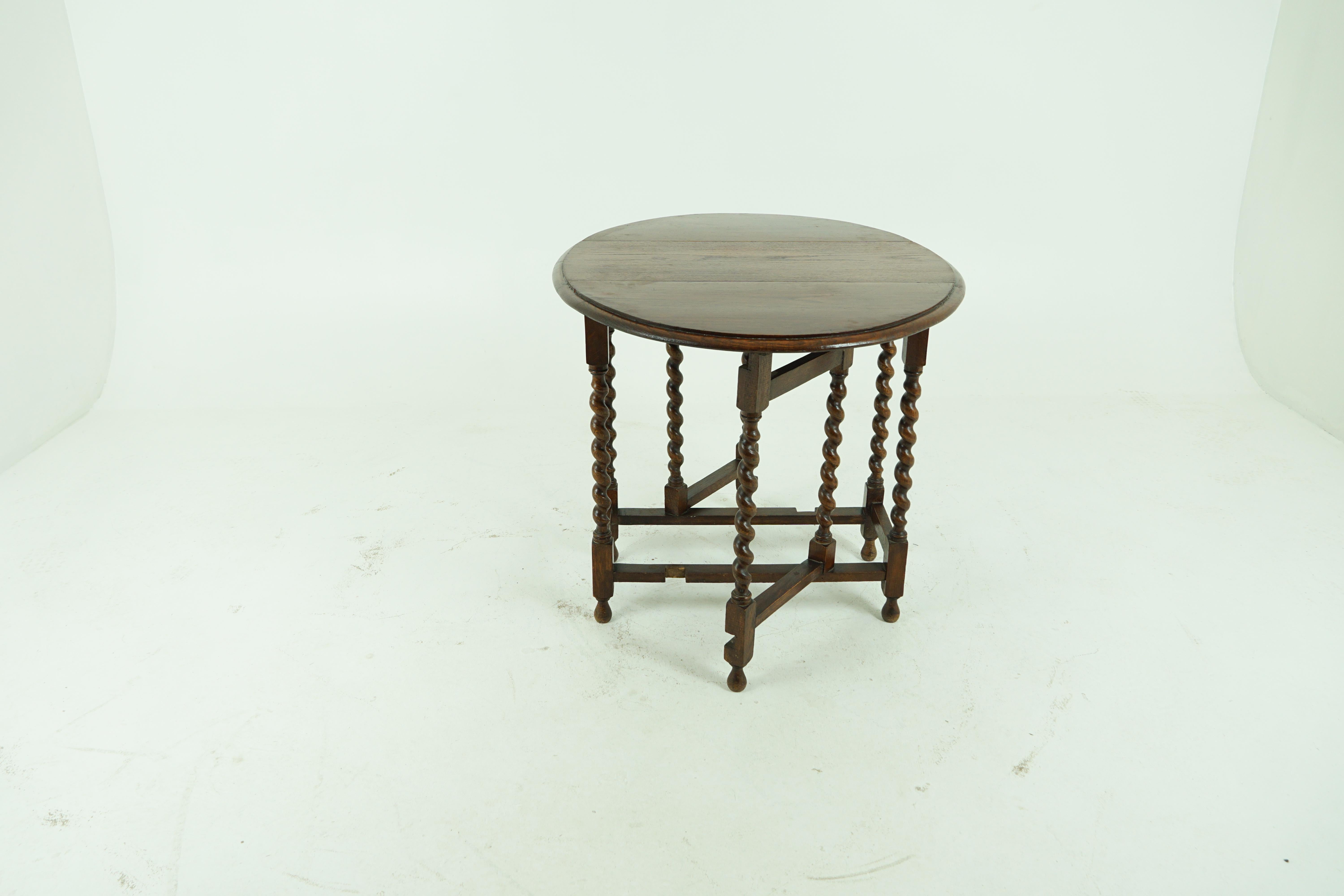 Antique oak table, barley twist drop leaf Gateleg table, lamp table, antique furniture, Scotland 1920, B1679

Scotland, 1920
Solid oak construction
Original finish
Rectangular top
Pair of half moon leaves to each side
Standing on tall barley