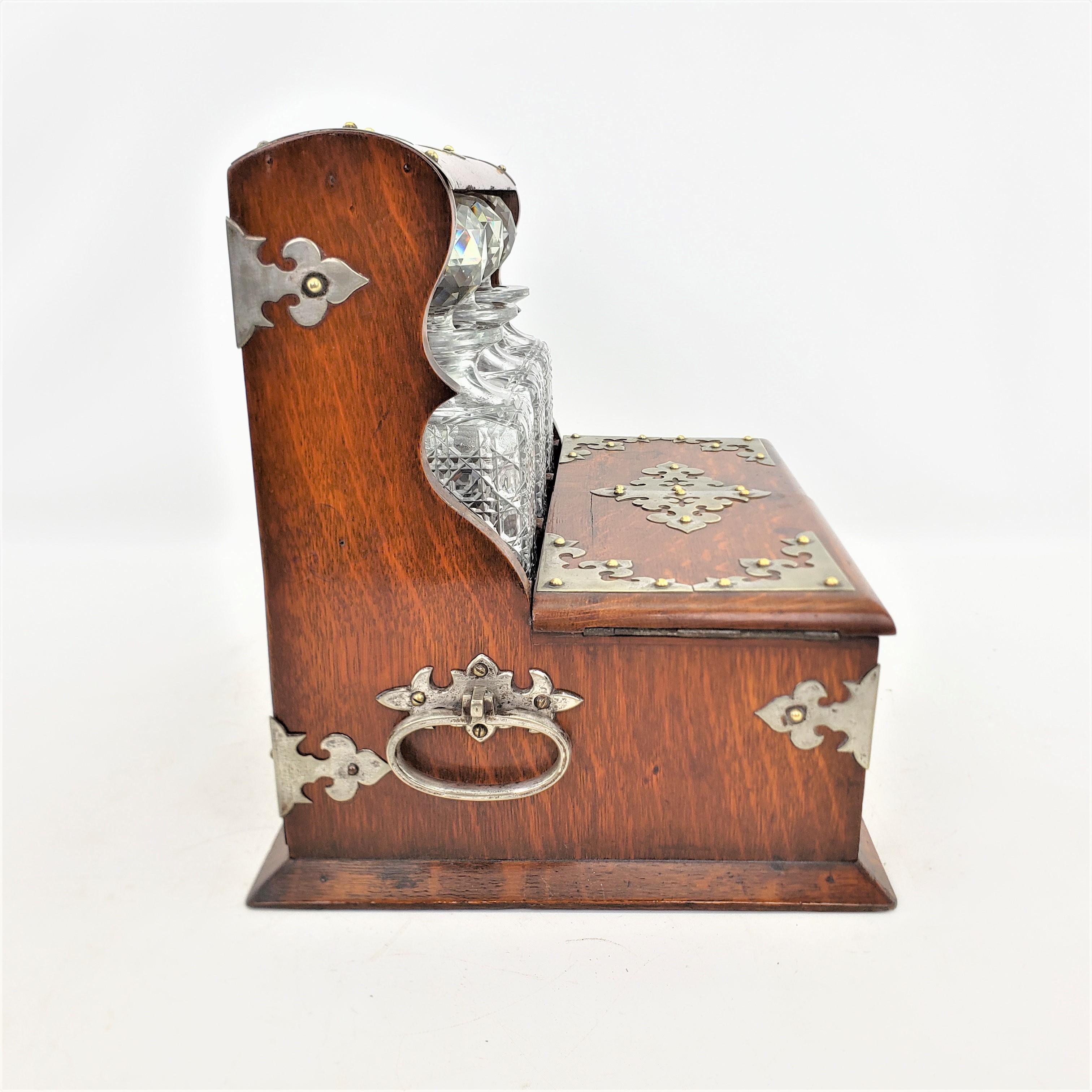 Machine-Made Antique Oak Tantalus with Ornate Silver Plated Mounts & Games Compendium Set