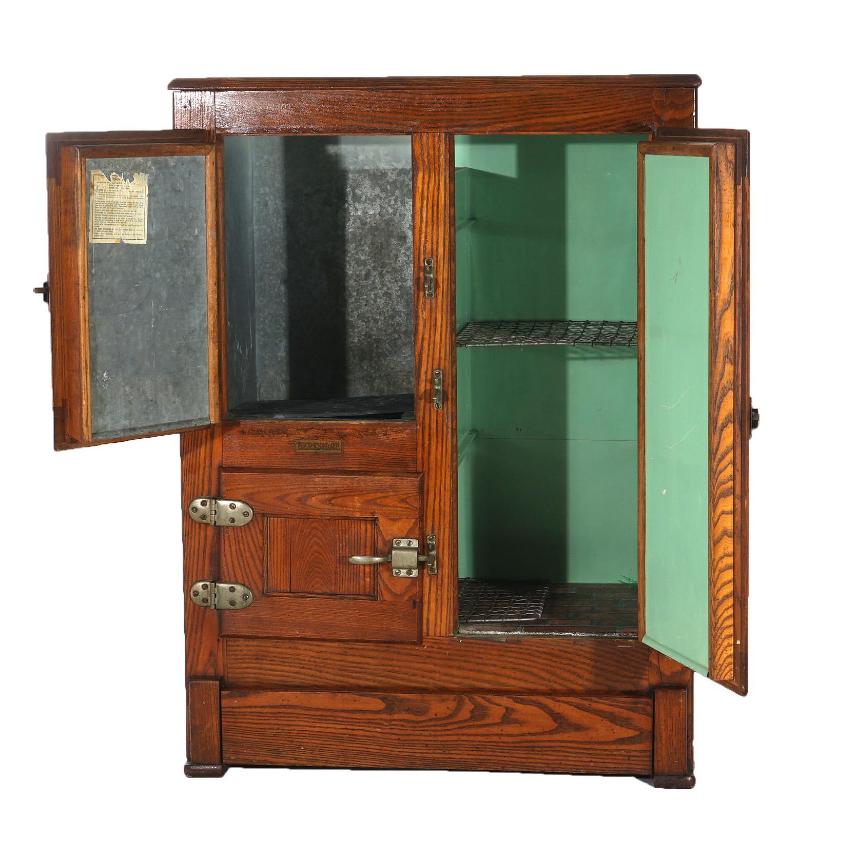 ***Ask About Reduced In-House Shipping Rates - Reliable Service & Fully Insured***
Antique Paneled Oak Three-Door Icebox with Original Finish & Label C1920

Measures- 43''H x 31.75''W x 19''D