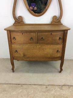 Antique Oak Three Drawer Dresser with Mounted Oval Mirror