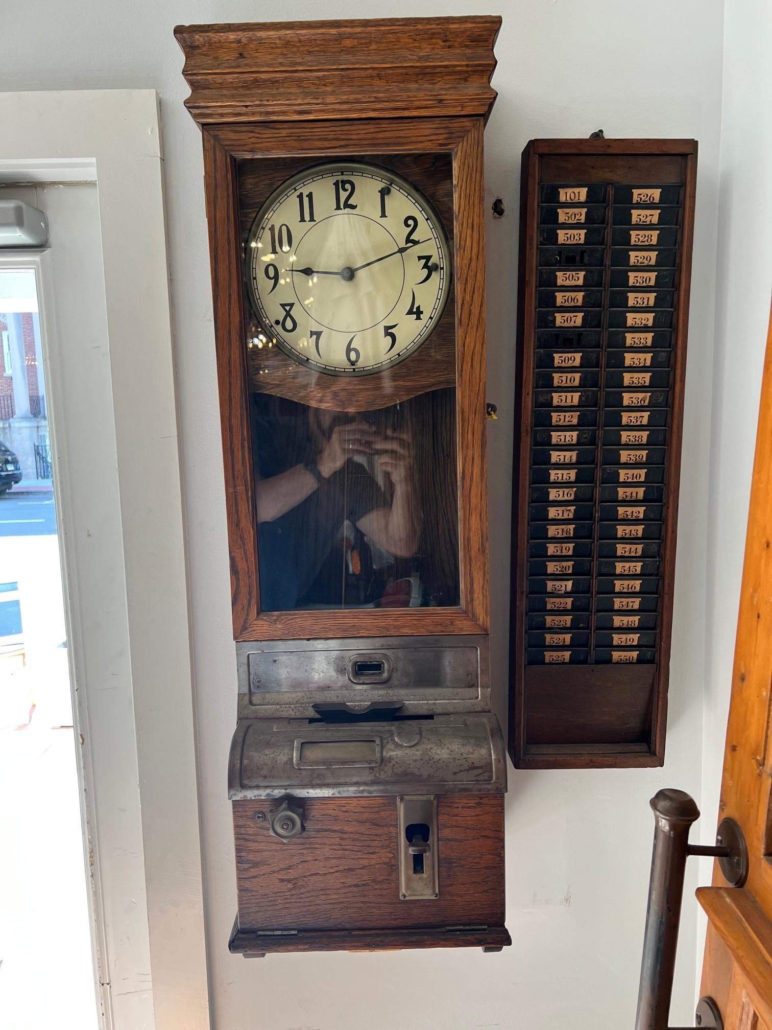 A great piece of American history, antique oak wall time clock with a workers card file. This is a nice find from an Upstate NY home original used in a factory in Upstate NY. I do not see a manufacturer's name on the clock but it is very similar to