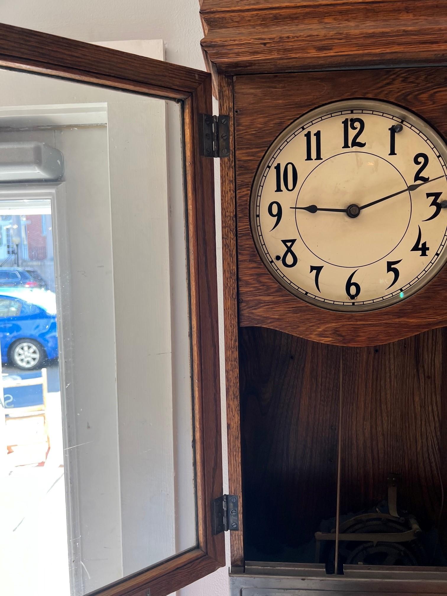 Antique Oak Time Recorder, Wall Punch Clock with Worker Time Card Rack      In Good Condition In Stamford, CT