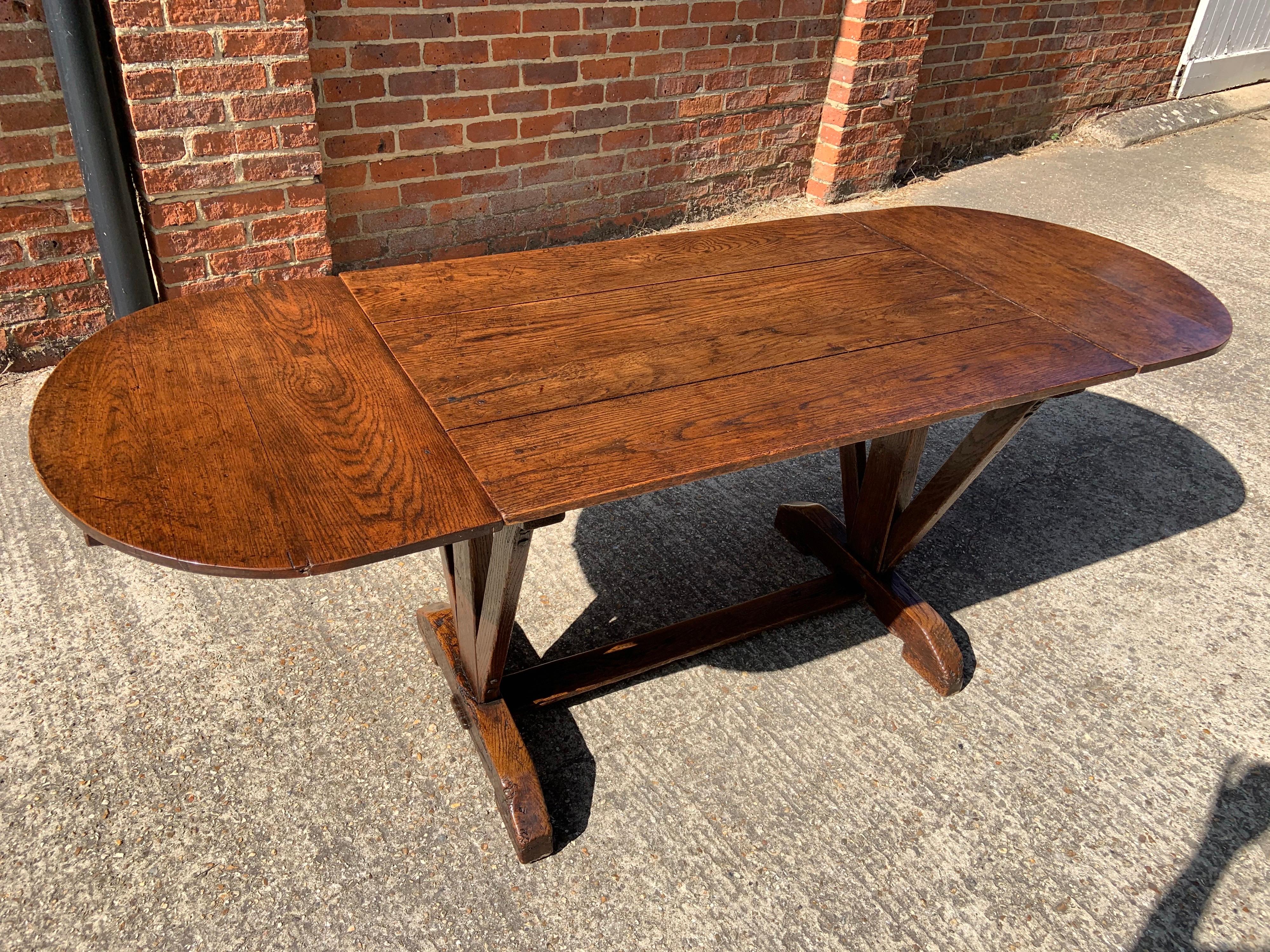 British Antique Oak Trestle Table with Two Half Moon Leaves