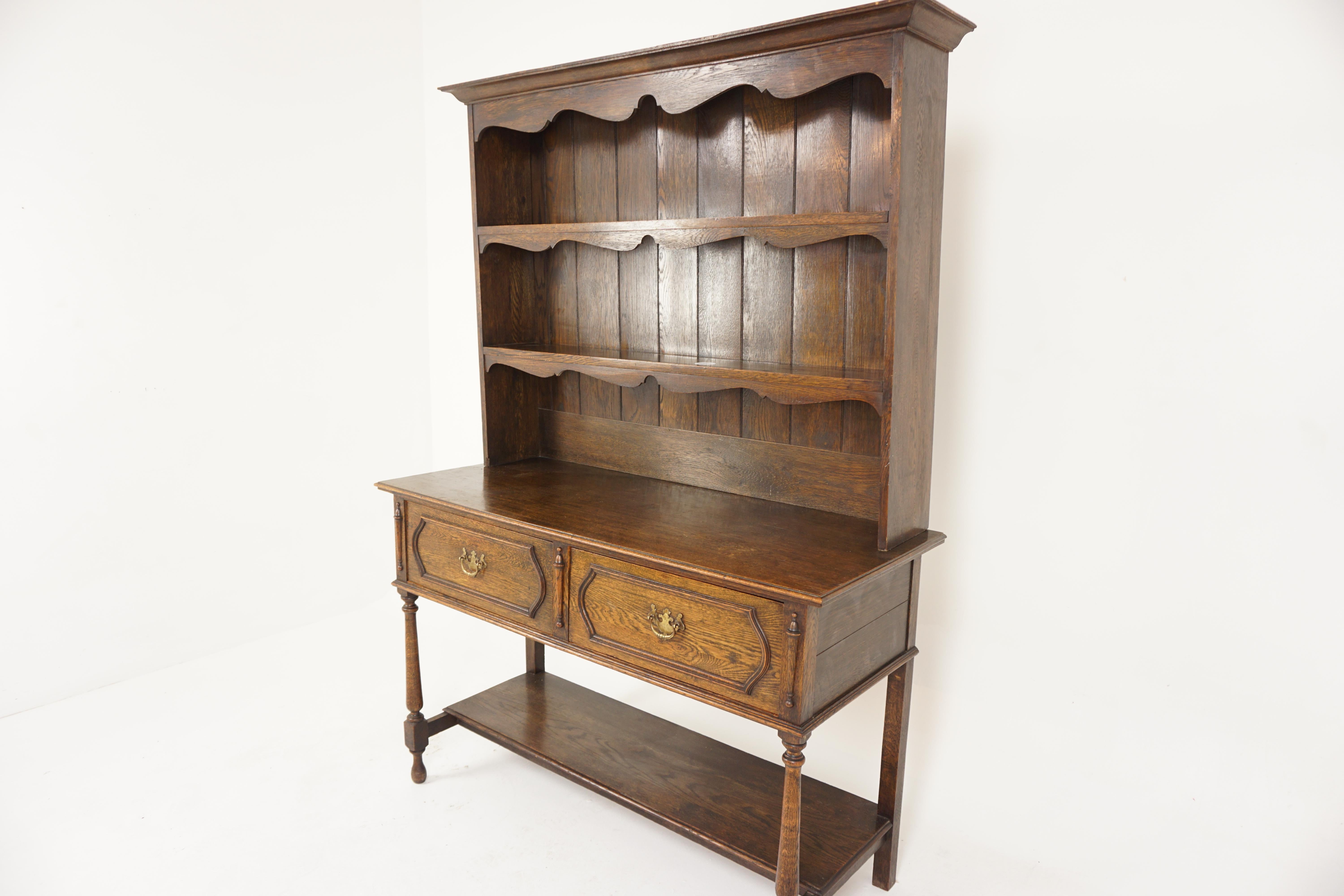 Antique Oak Welsh dresser, sideboard, buffet and Hutch, Scotland 1910, H799

Scotland 1910
Solid Oak
Original finish
Moulded cornice with wavy frieze underneath
Oak vertical slats to the back
Pair of open shelves with groove on top
Base with