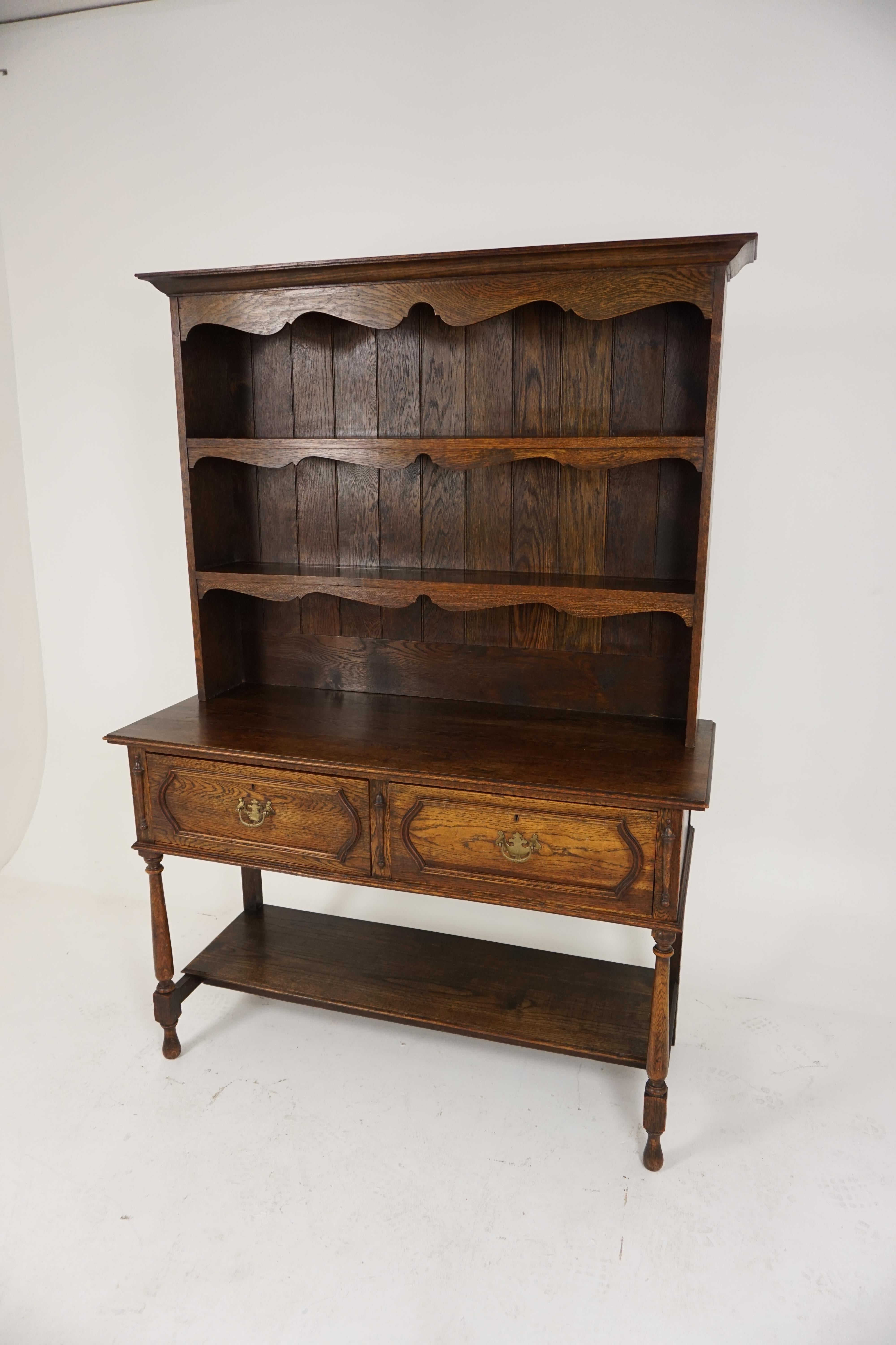 Antique oak welsh dresser, sideboard, buffet, Scotland 1910, B1825

Scotland, 1910
Solid oak
Original finish
Canopy top
Shaped frieze below
Fitted with open shelves underneath
All fitted with solid backboards
Base with rectangular top
Pair