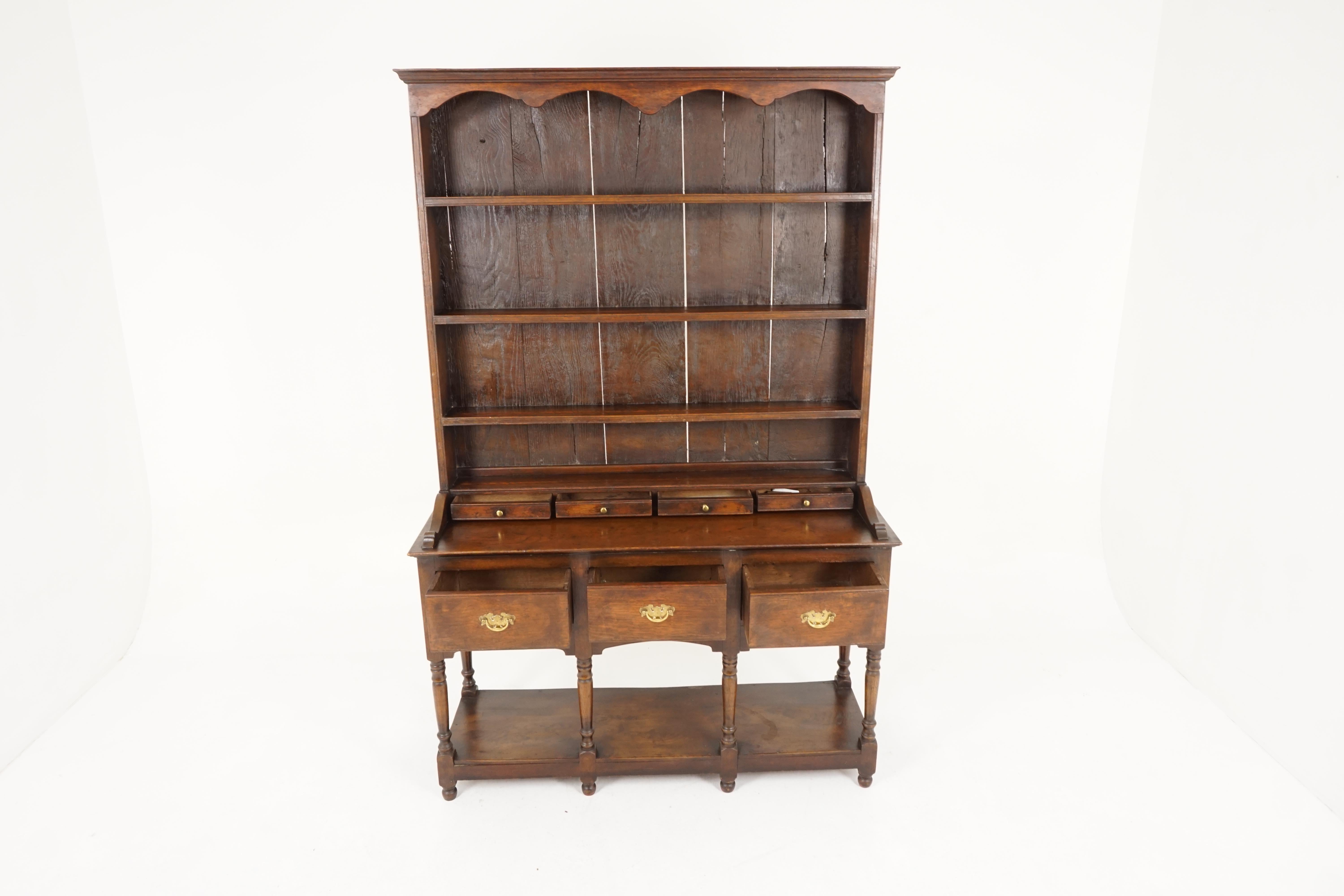 Antique oak welsh potboard dresser, sideboard buffet, Scotland 1920, B2162

Scotland 1920
Solid oak
Original finish
Moulded cornice with shaped apron underneath
Four shelves have moulded edges and a plate support
Four small spice drawers
