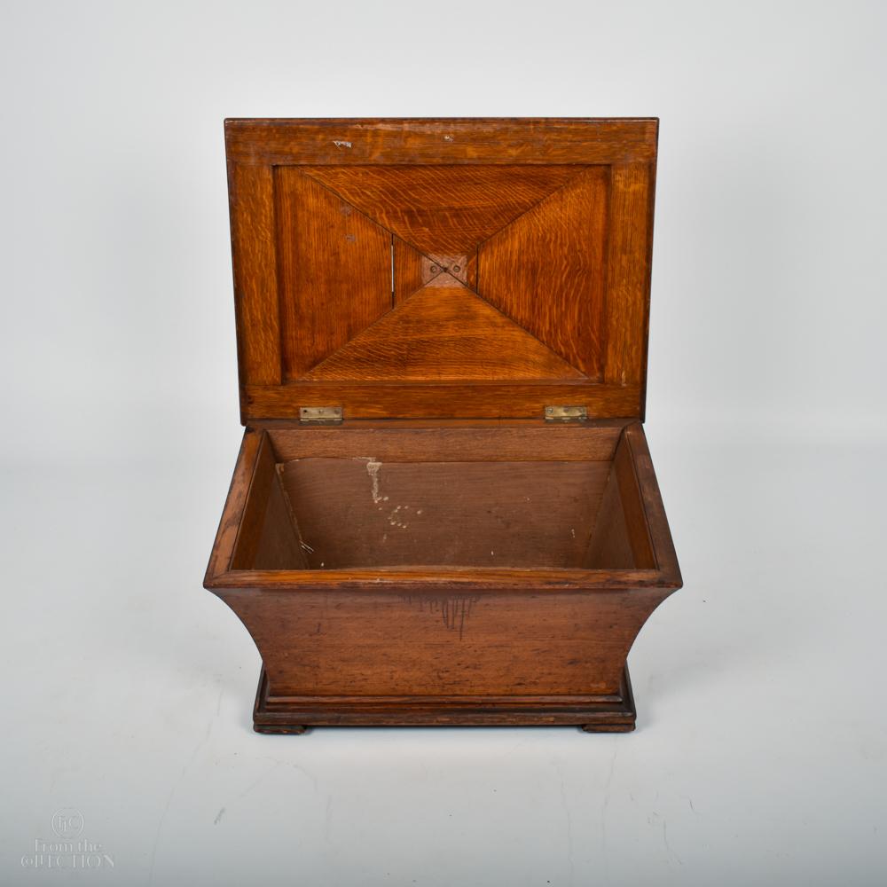 An an unusual oak wine cooler of Gothic influence and Pugian style. Circa. 1900.