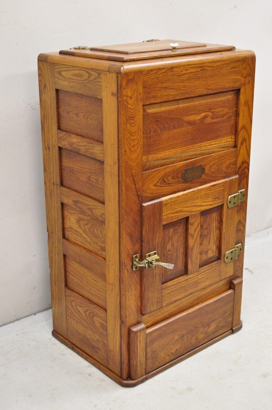 Antique Oak Wood Belding Hall Century Refrigerator Narrow Ice Box Chest. Circa Early 1900s. Measurements: 39