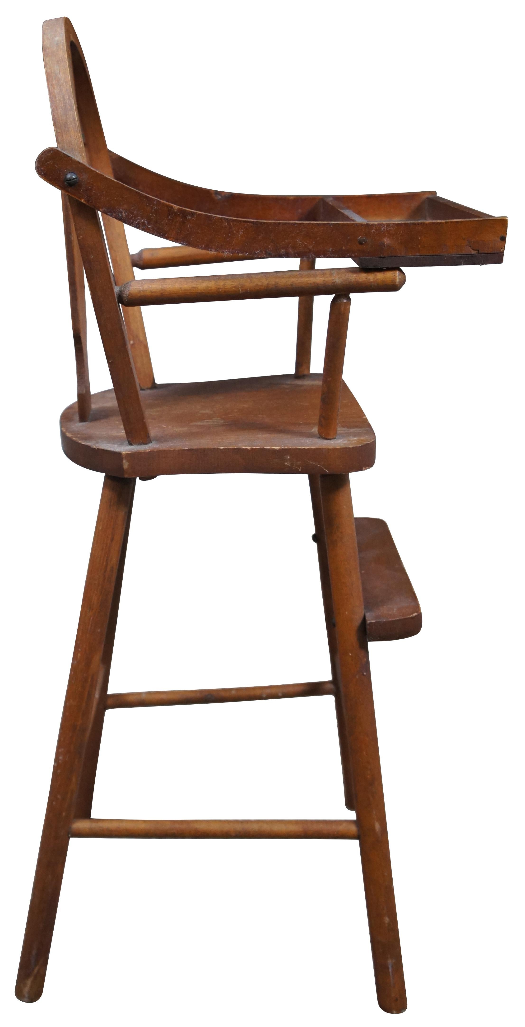 vintage wooden high chair with tray