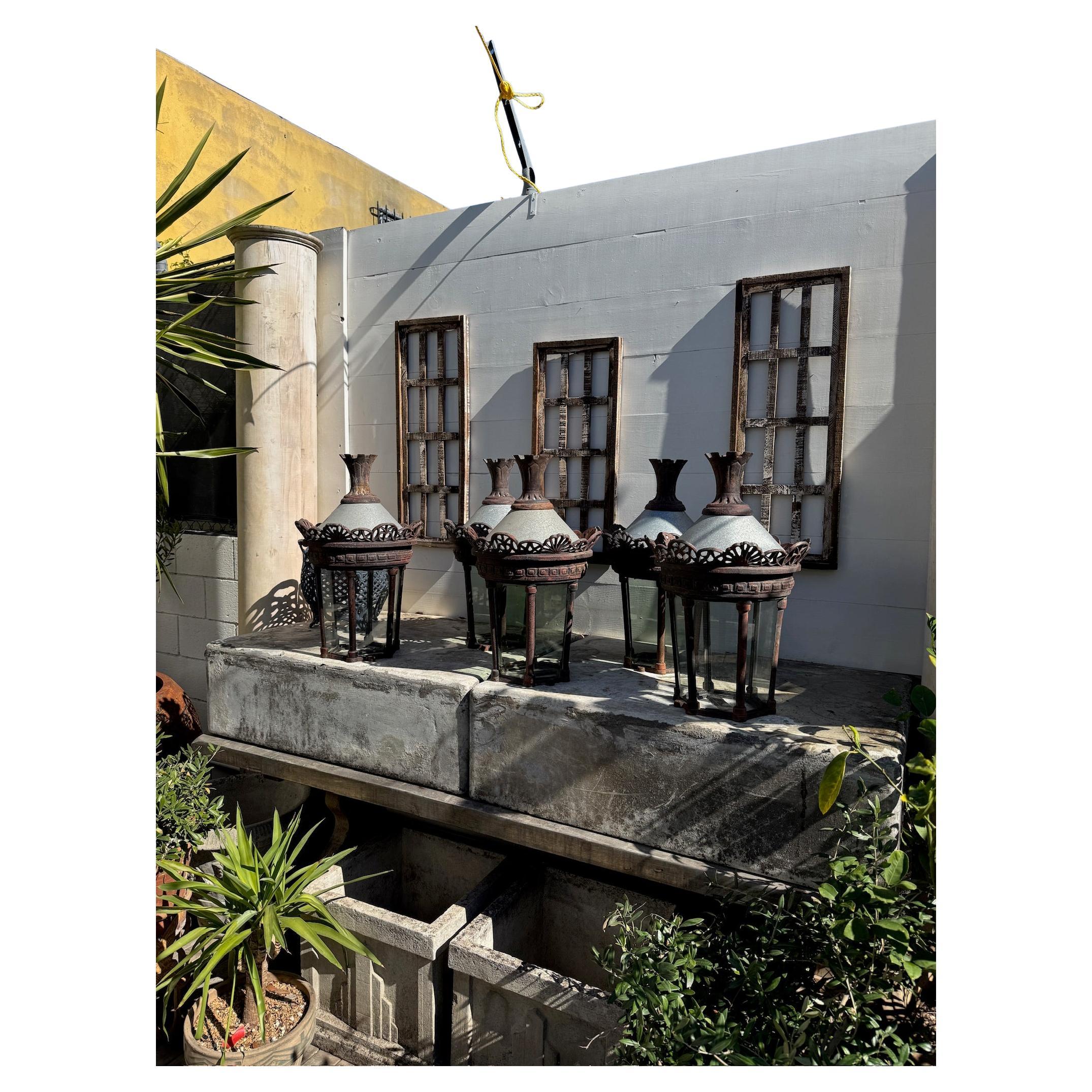 Elevate your outdoor or restoration project with these antique cast metal street lantern fixtures. There are six available in this size. 

A stunning set of 11 antique cast metal street lantern fixtures, styled after historic O’Connell Street lamps