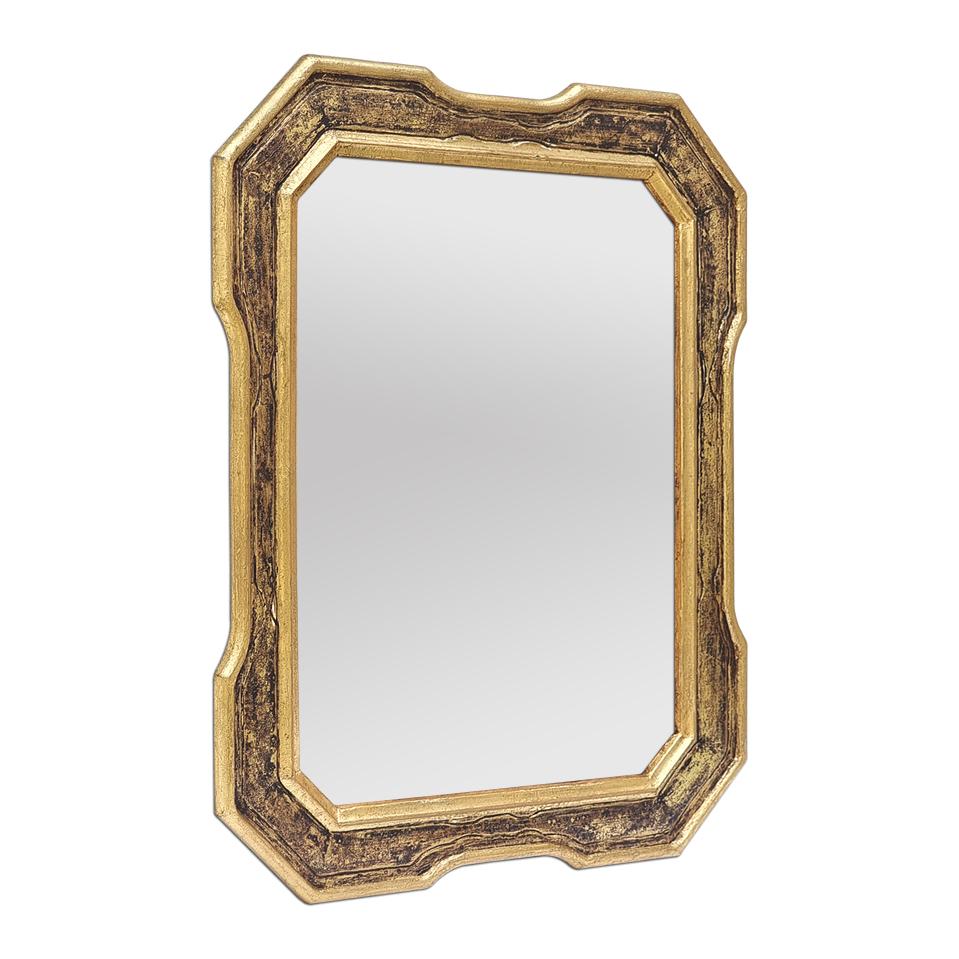 Rare miroir en bois doré et patiné noir de forme octogonale, vers 1960. Dorure à la feuille patinée. Le cadre ancien mesure 7,5 cm de large. Miroir en verre moderne. Dos en bois.