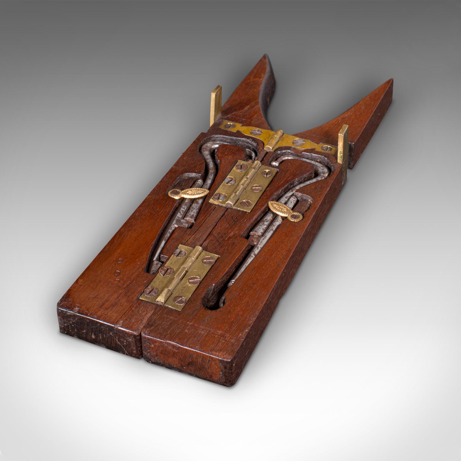 This is an antique Calvary officer's field boot jack. An English, oak and brass campaign shoe pull with tools, dating to the Georgian period, circa 1800.

Fascinating boot aid, ideal for field use in the time of the Napoleonic Wars
Displays a