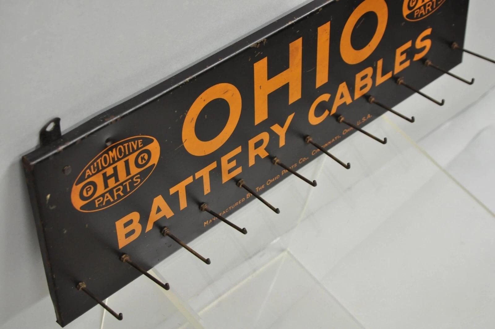 Antiguo Ohio Cables de la batería Estaño Metal Negro y Naranja Tienda de piezas Display Otro en venta