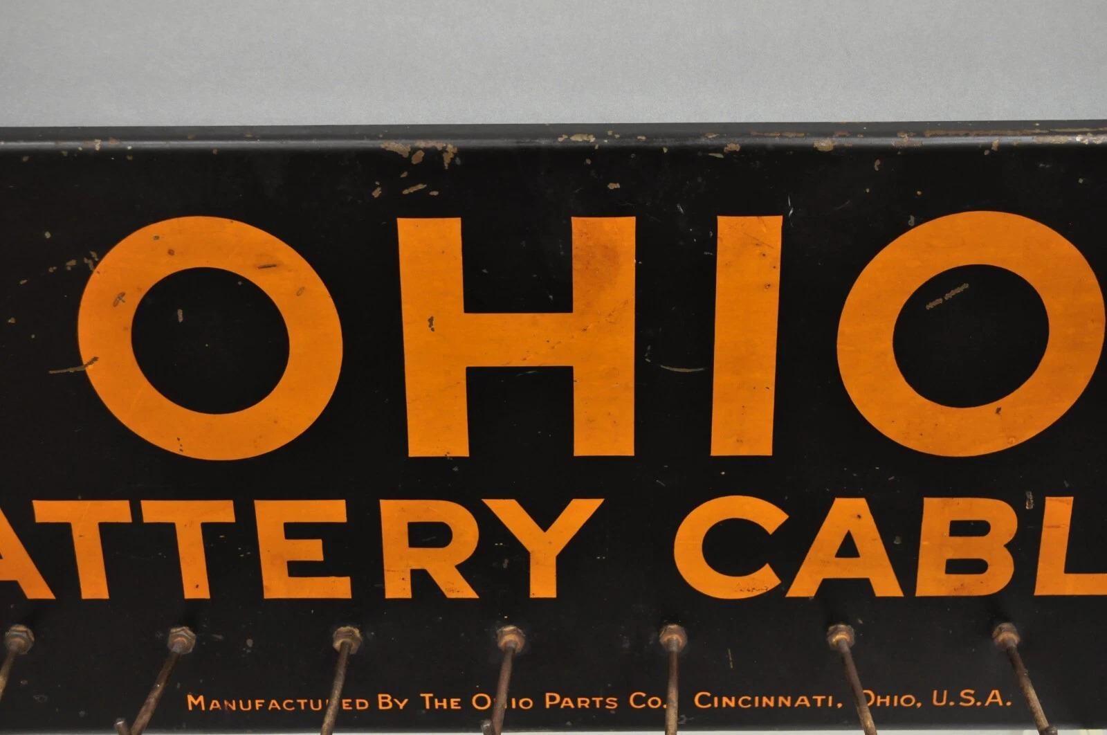 Antiguo Ohio Cables de la batería Estaño Metal Negro y Naranja Tienda de piezas Display Desconocido en venta