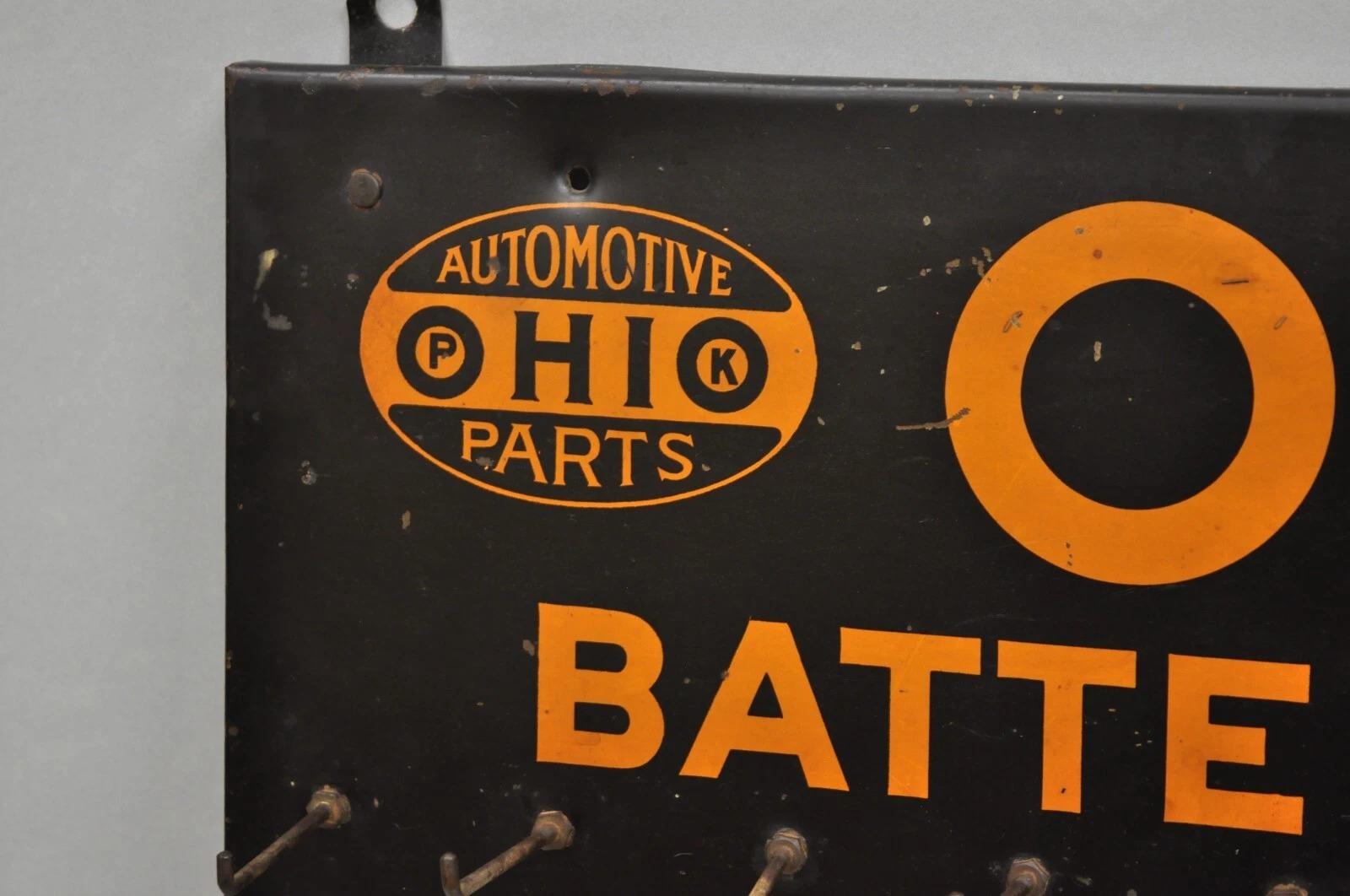 Antiguo Ohio Cables de la batería Estaño Metal Negro y Naranja Tienda de piezas Display siglo XX en venta