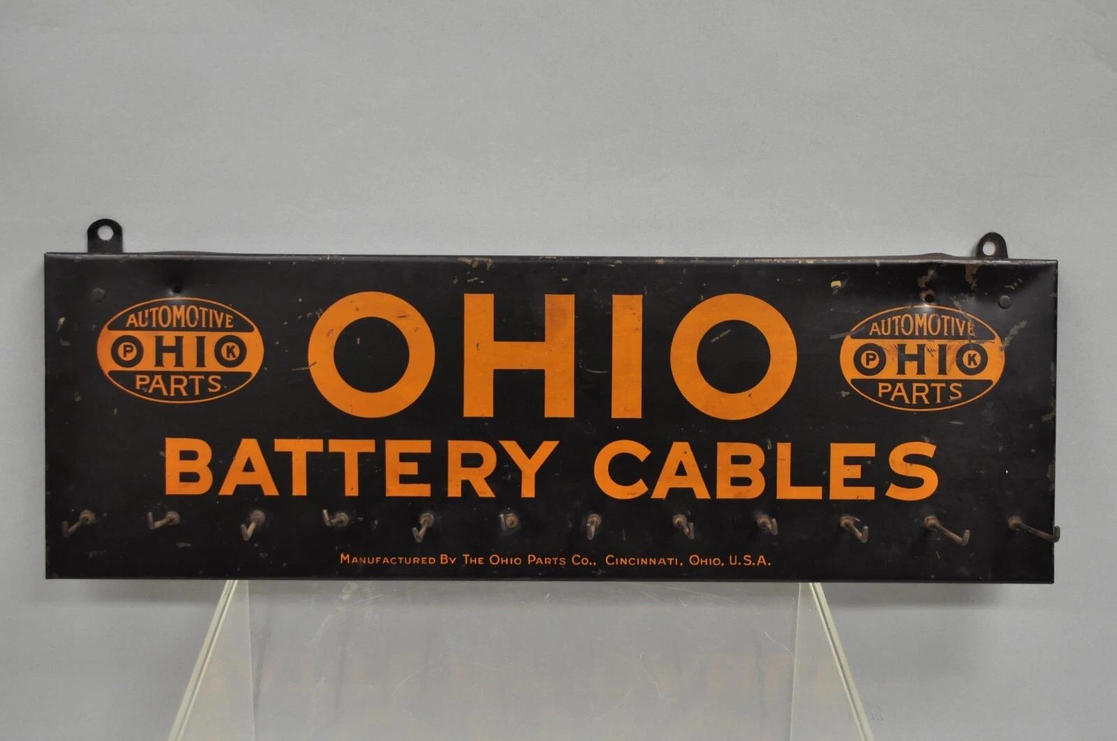 Antiguo Ohio Cables de la batería Estaño Metal Negro y Naranja Tienda de piezas Display en venta 3