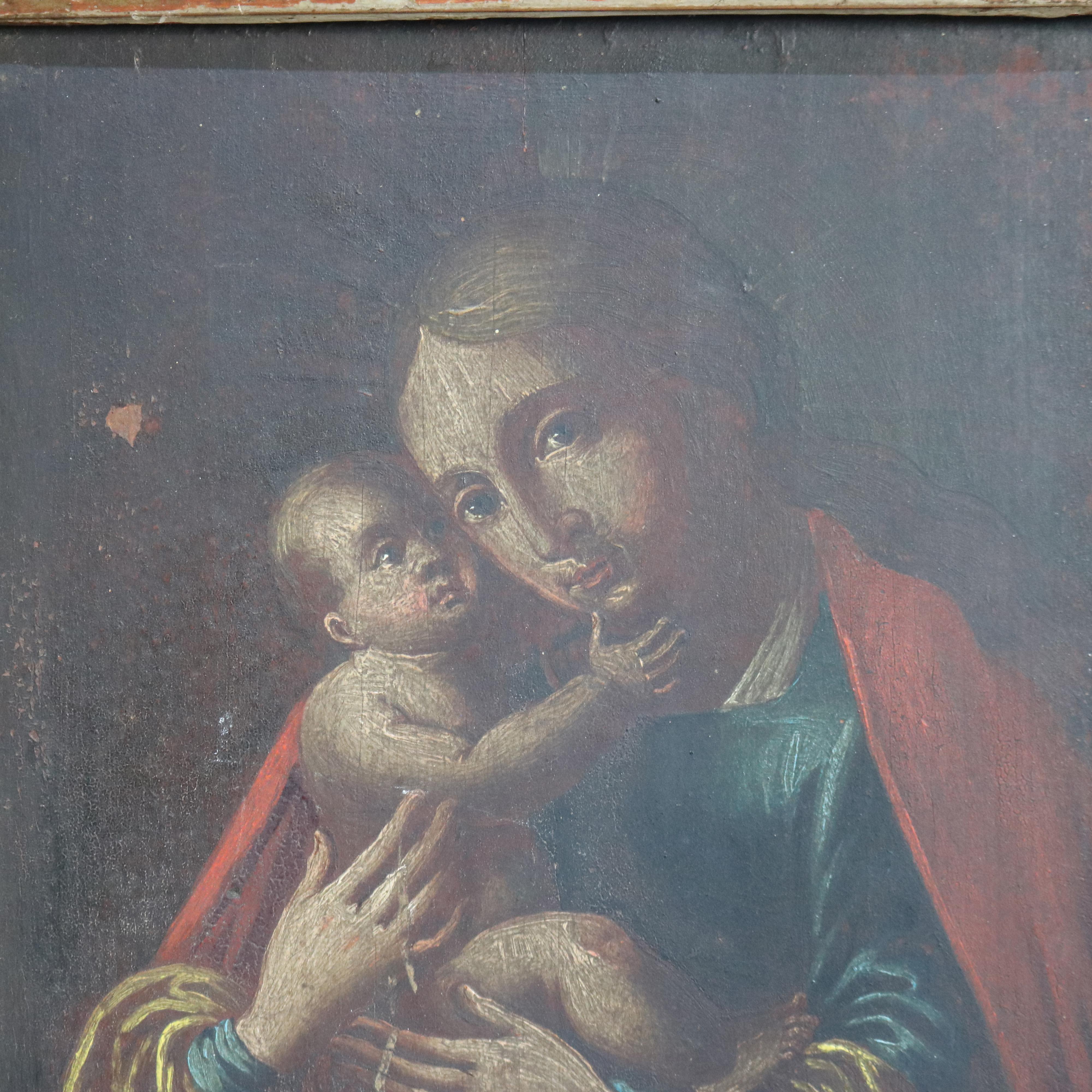 Antico dipinto a olio su tavola con icona della Madonna e del Bambino del XVIII sec.

Misure: 13