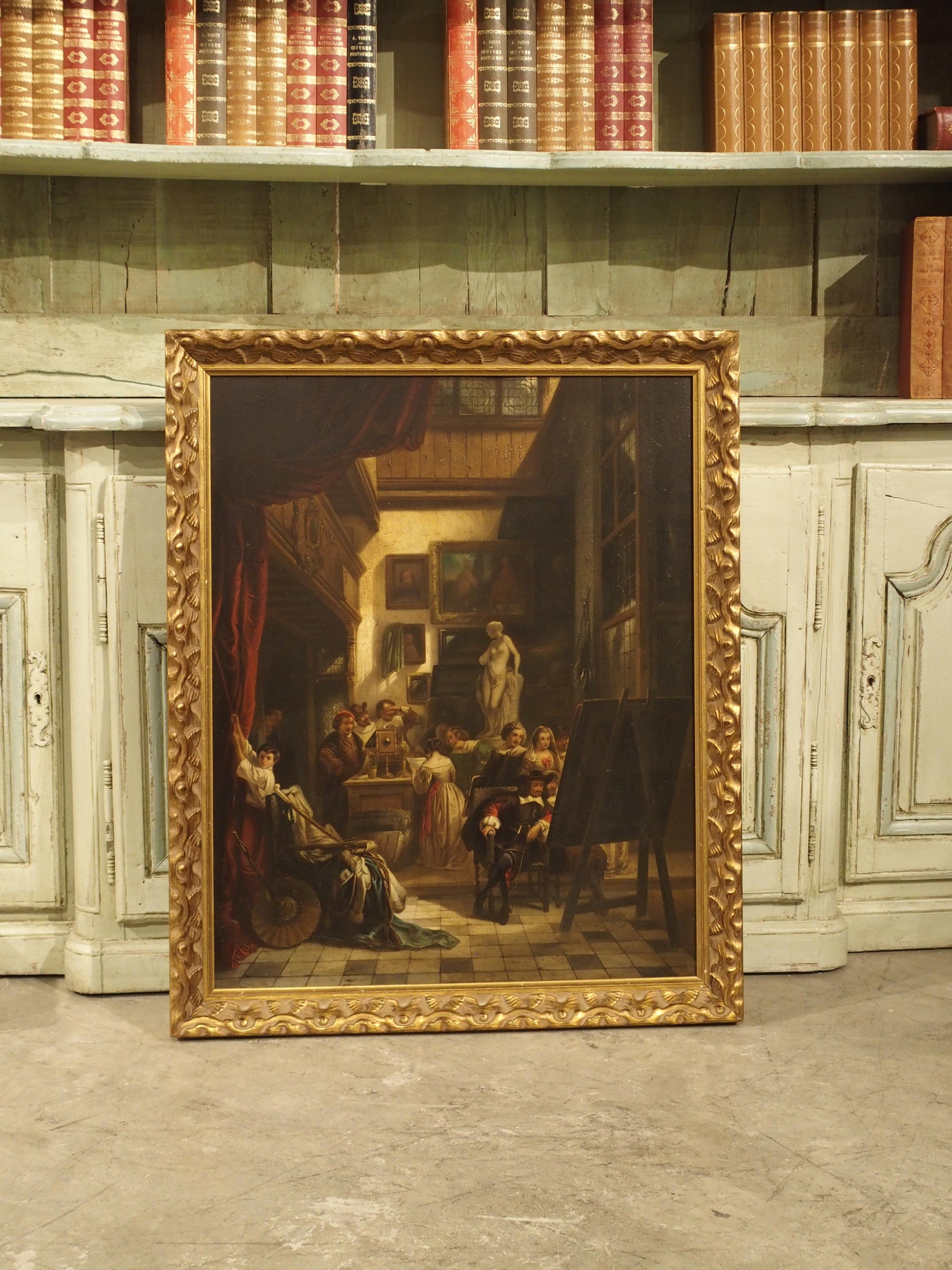 This fantastic oil on board painting is entitled “The Mayor of Amsterdam in Rembrandt’s Studio”. The painting is surrounded by a gilt frame adorned with beading and sinuous medallions.

A rich three-dimensional scene is depicted by utilizing a