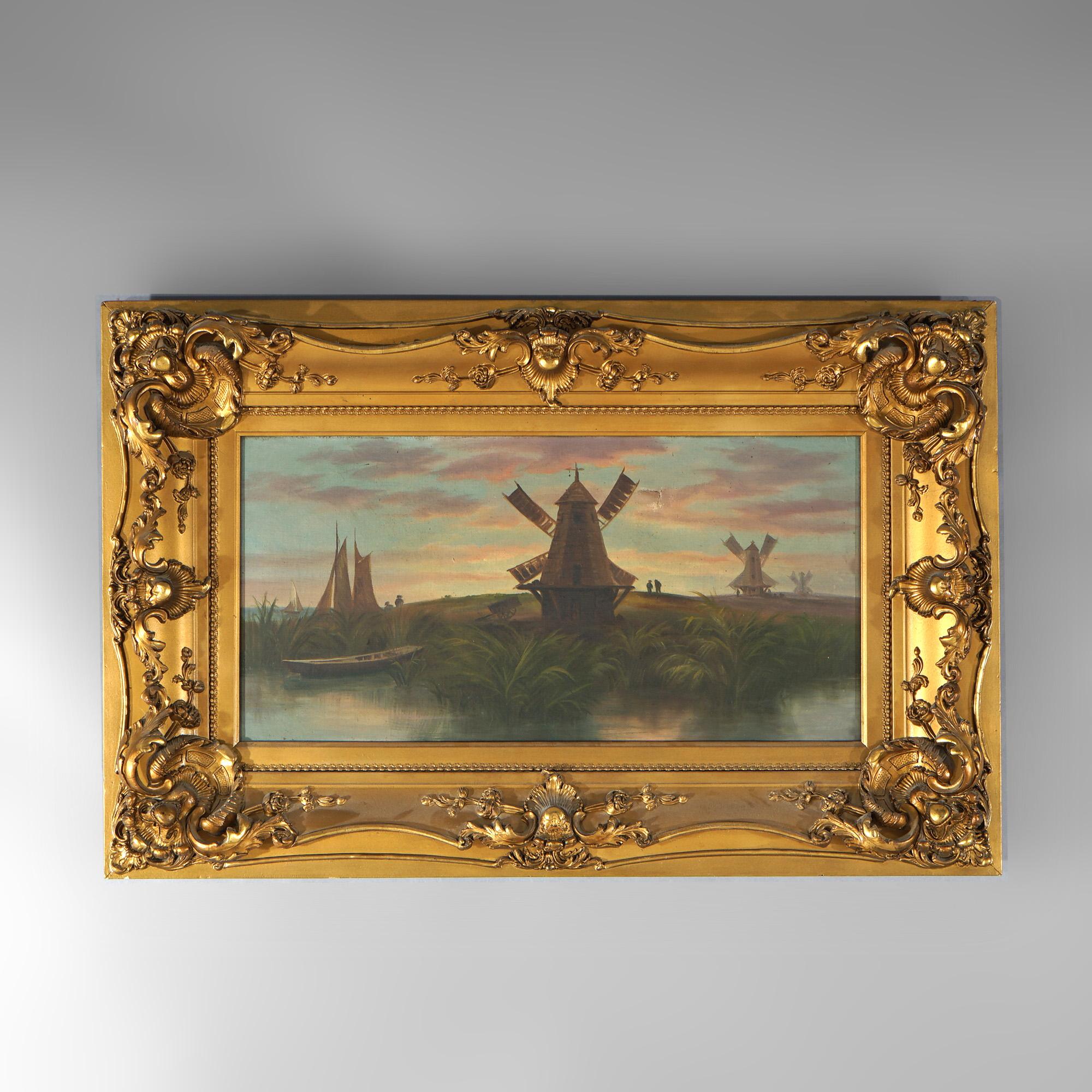An antique Dutch painting offers oil on canvas landscape scene with windmills, waterway and boats, seated in giltwood frame, c1890

Measures - overall 21.75