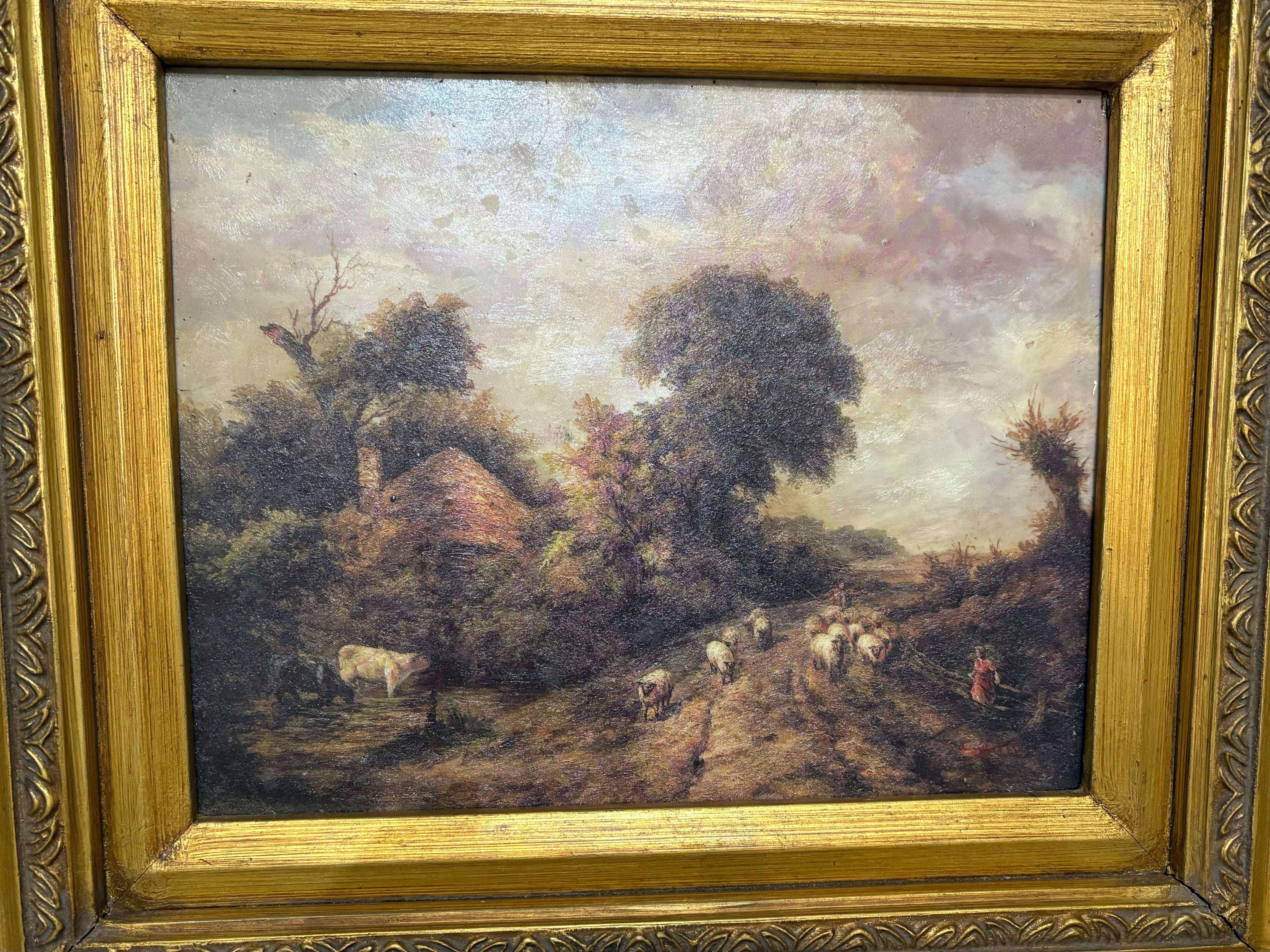 Purchased in the Cotswolds region of England, this oil on canvas is a stunning depiction of a landscape with a Shepherd, a shepherdess, sheep, and a cow.  The canvas itself measures 9 wide by 7 tall, though the overall framed piece is 20.50 wide and