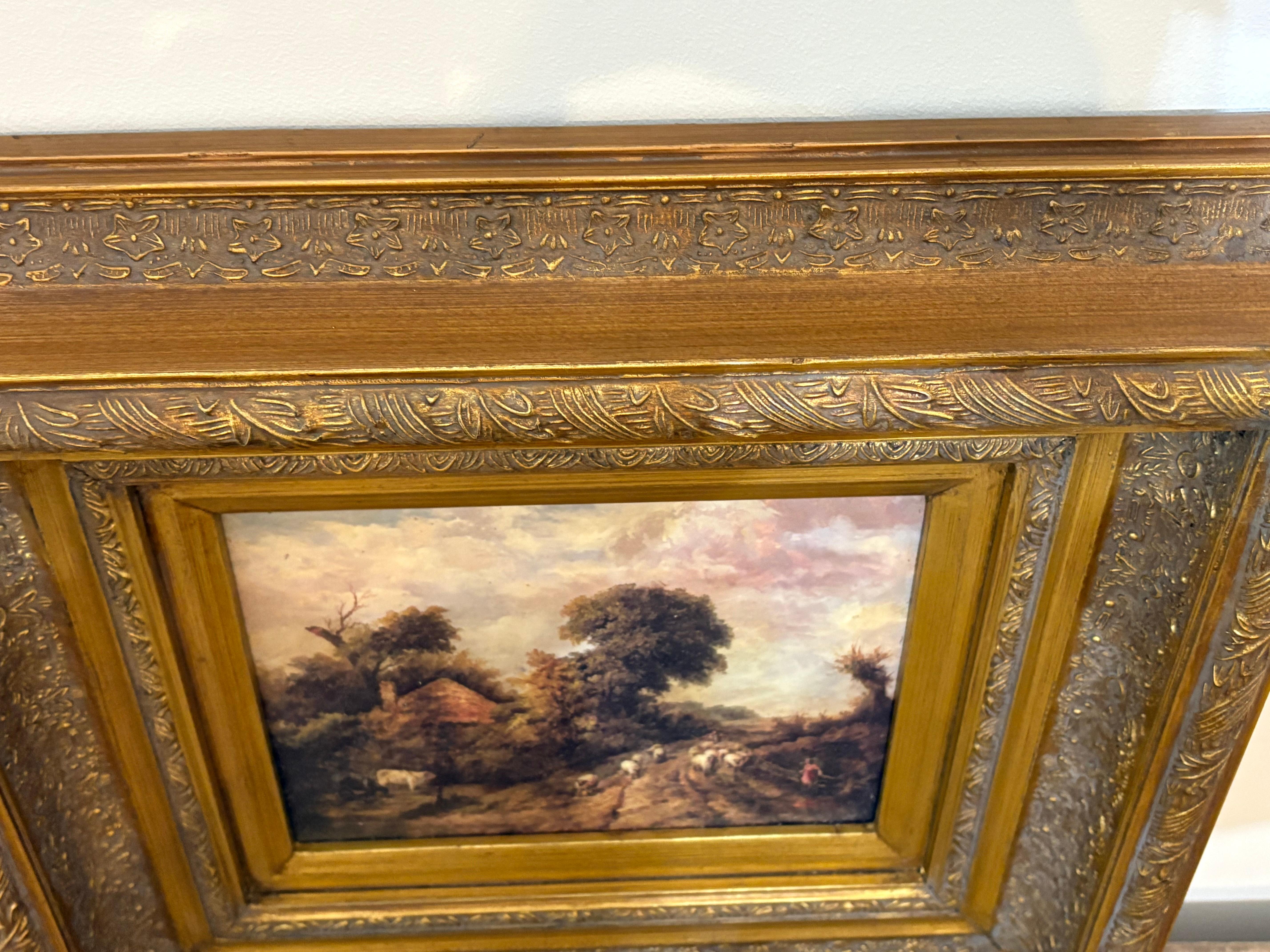 French Provincial Antique oil on canvas of landscape with shepherd and sheep in gilt gesso frame.