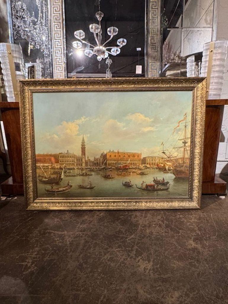 Very fine antique painting of a busy Venetian harbor. Featuring beautiful architecture, boats, and figures. A wonderful piece of art! Circa 1920.
58w x 42h