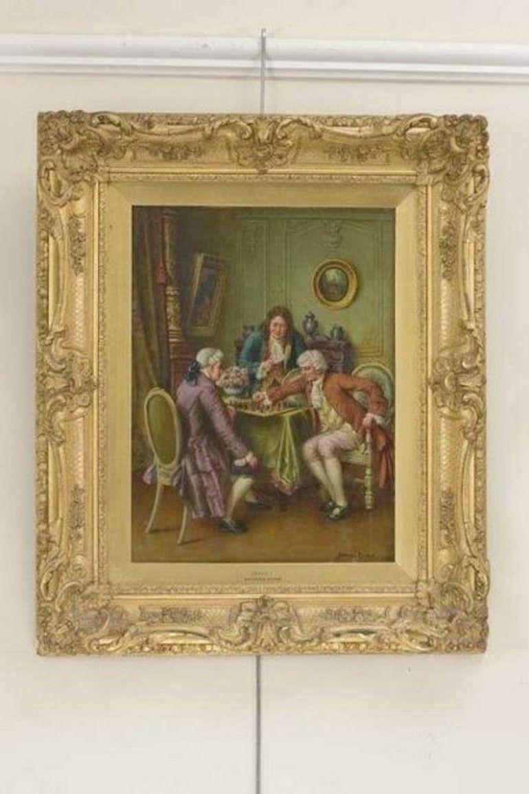 Oil on board with two men playing chess in an 18th century interior while a third smokes a clay pipe, in the original frame, signed.
         