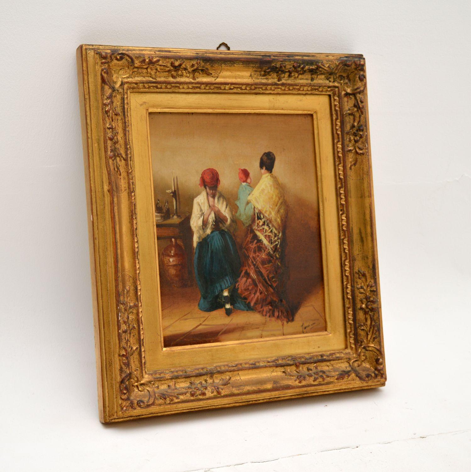 An absolutely gorgeous antique oil painting in a wonderful gilt wood frame. It likely dates from around the 1900-1920 period, possibly earlier. We are not sure of the origin, but the subjects look like Spanish women, so we would guess it to be