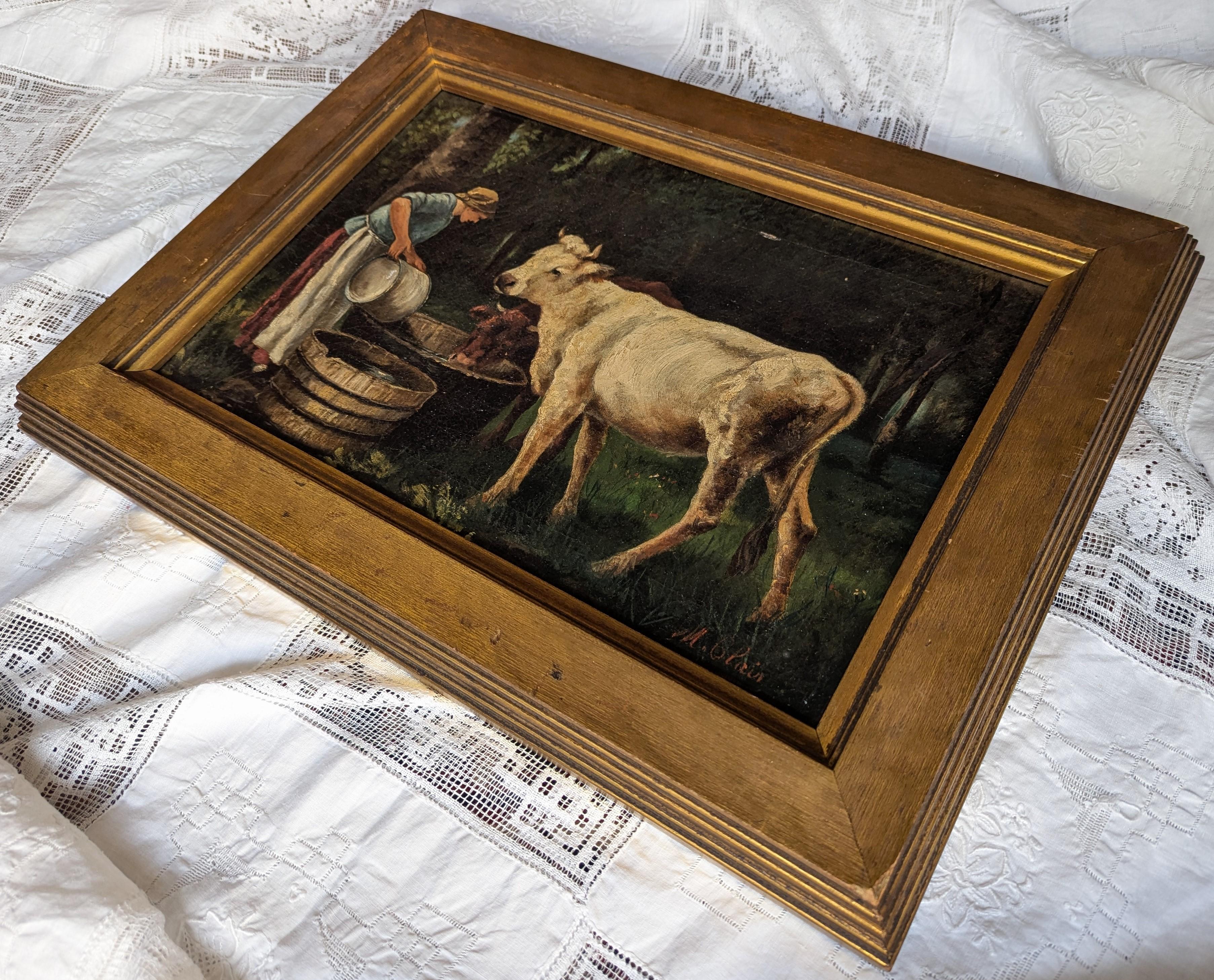 Antique oil painting in the manner of French artisan Julien Dupré of a woman with cows. Signed on the bottom although the artist is unknown, this was most likely done as a study piece in an art school (century unknown). Measures 15.75 inches in