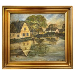 Antique oil painting of small Scandinavian rural village mirrored in the lake
