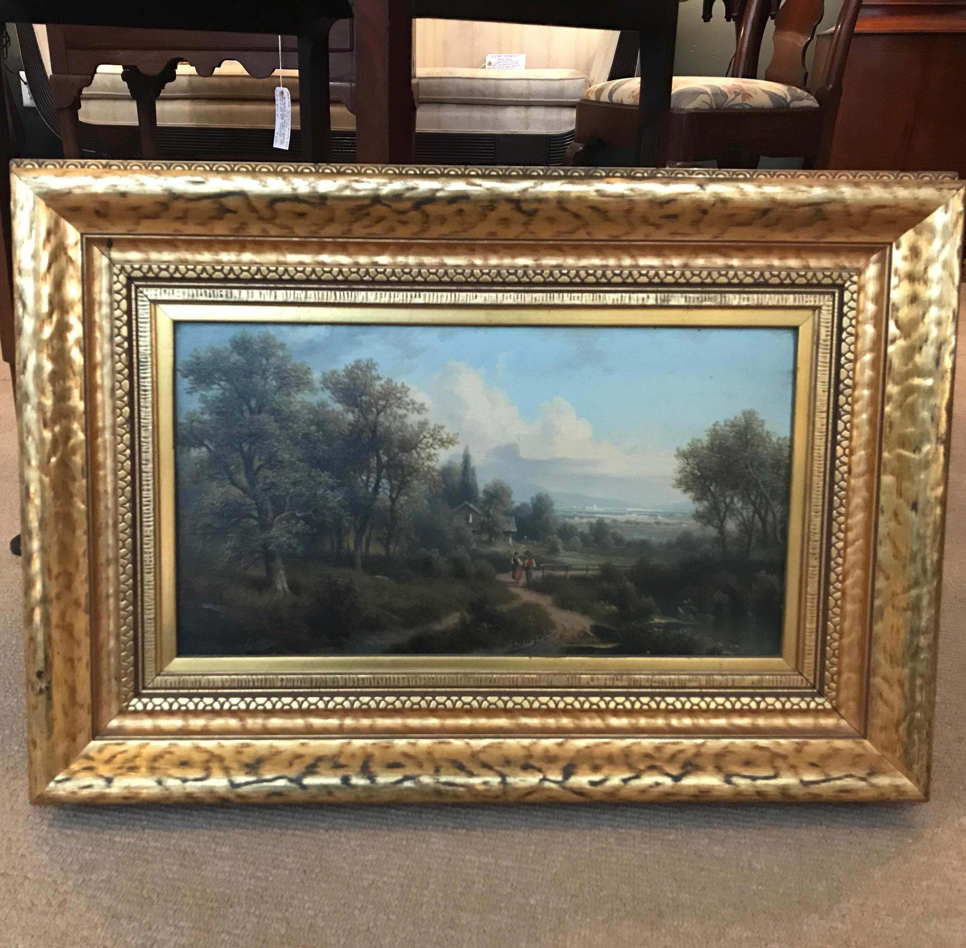 Stunning 19th century bucolic scene in original giltwood frame. The original oil painting is Artist-signed on the lower right ‘J. Baughman’ or some version of that and is mid-19th century circa 1840-1860 of English origin. The left of the painting