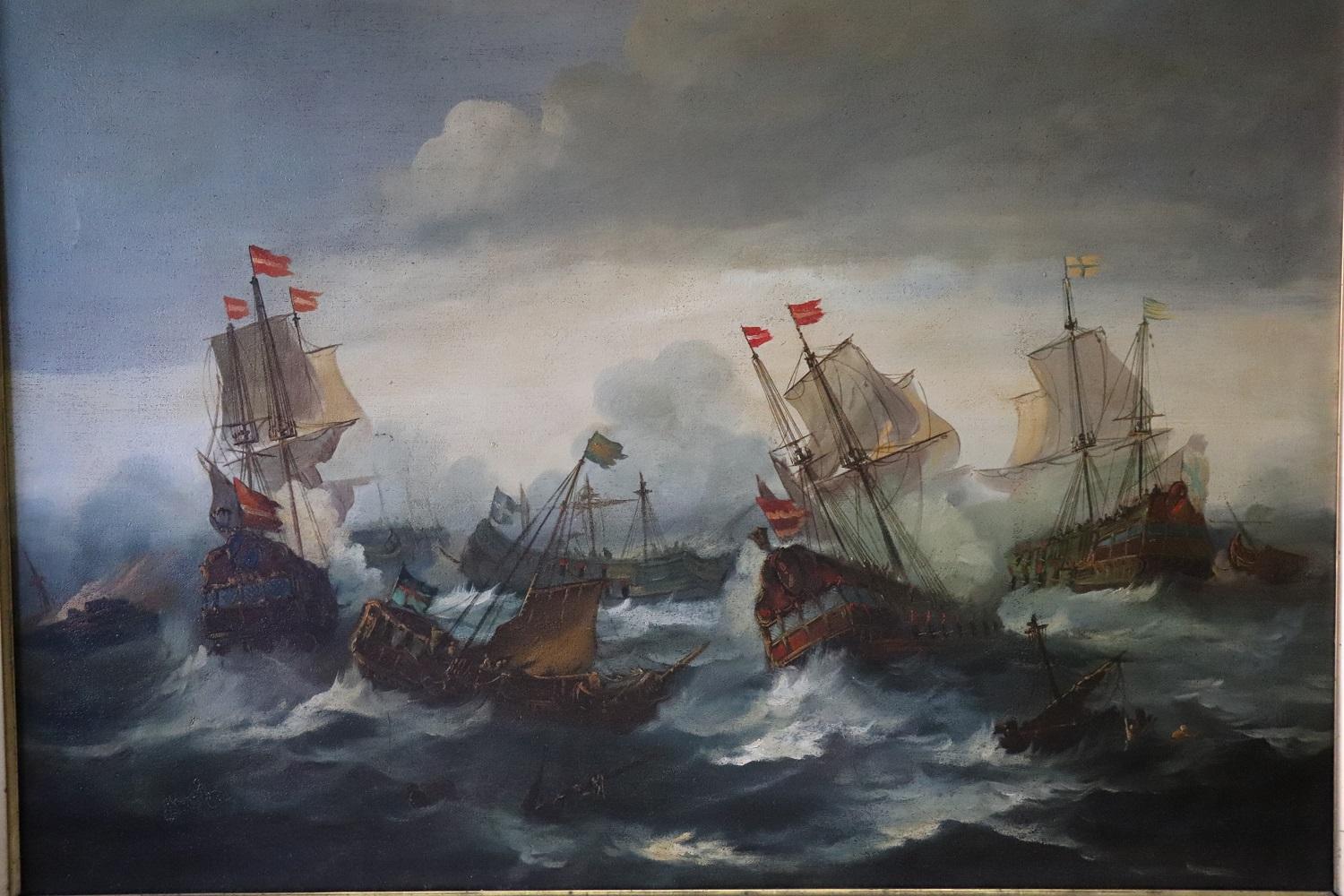 Beautiful antique marine oil painting on canvas, early 19th century. Excellent pictorial quality. Large antique Italian painting beautiful marine scene where some galleons fight in battle in the stormy sea. Excellent color rendering with great use