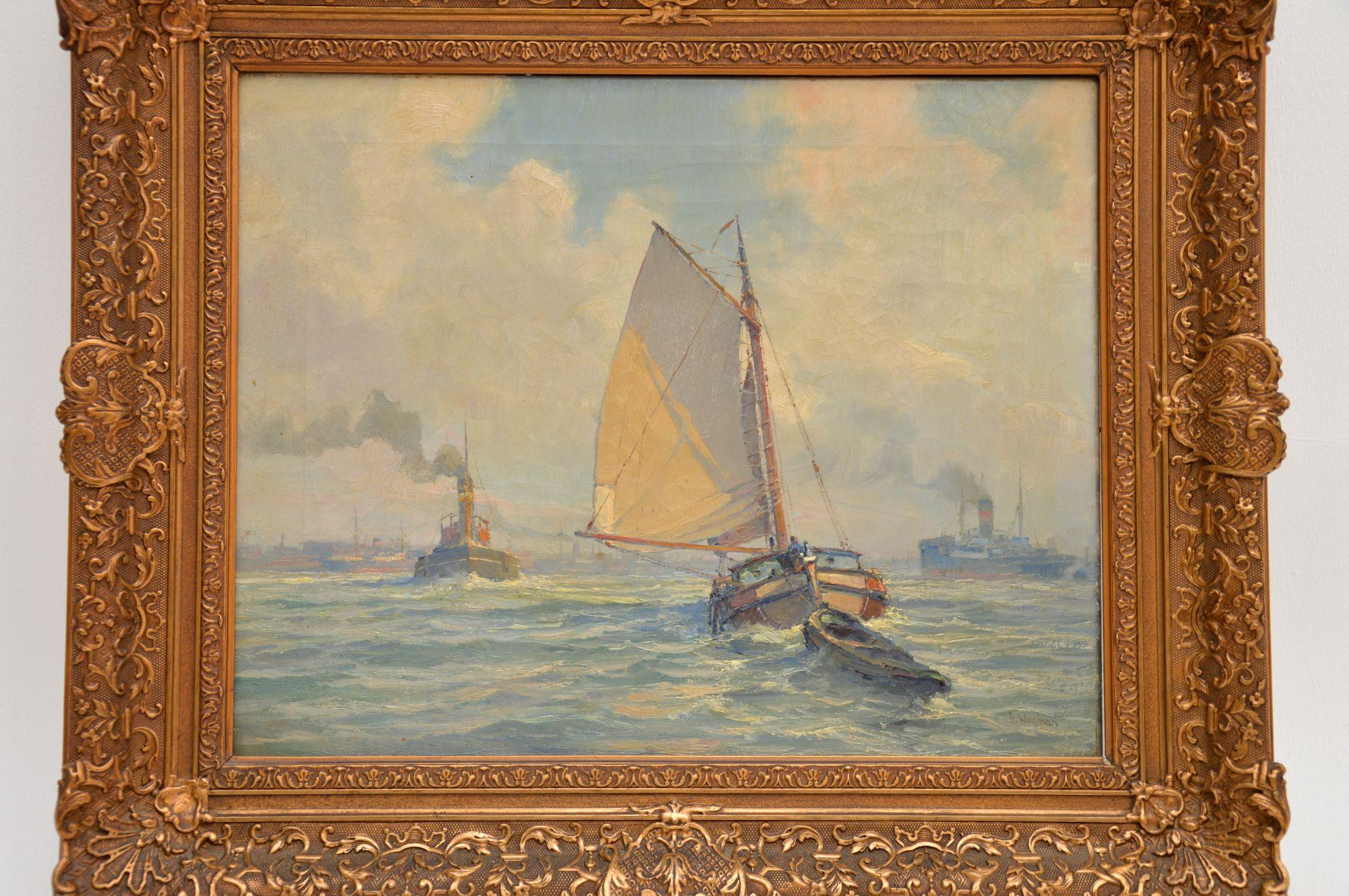 A beautiful antique oil painting on canvass by Gerard Wiegman (1875-1964). This is Dutch in origin, it was painted in the early twentieth century around the 1920-303’s.

It depicts a sail boat out at sea, with oil tankers leaving a harbour in the