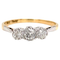 Antique Old Cut Diamond 18 Carat Yellow Gold and Platinum Three-Stone Ring