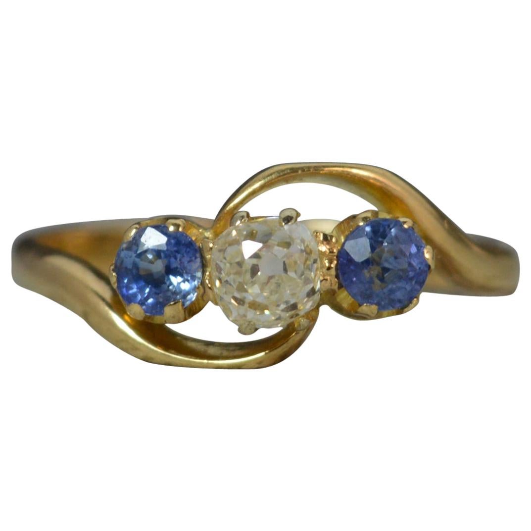 Antique Old Cut Diamond and Ceylon Sapphire 18 Carat Gold Trilogy Ring