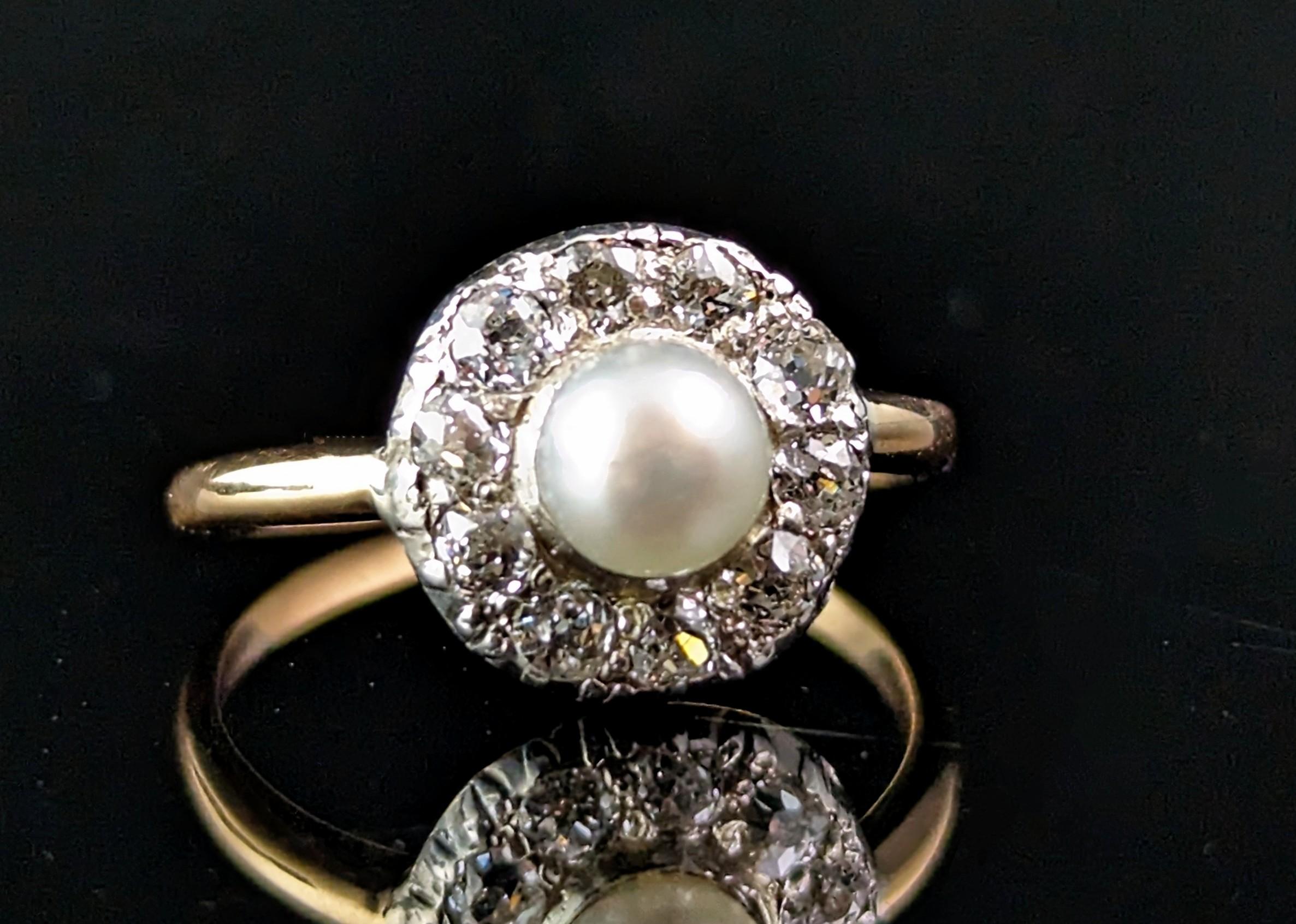 A beautiful antique 18ct gold diamond and pearl cluster ring.

A real showstopper of a ring it features a central lustrous pearl surrounded by a halo of sparkling old cut diamonds.

The pearl glows with a cool bluish hue, a highly desirable tone for