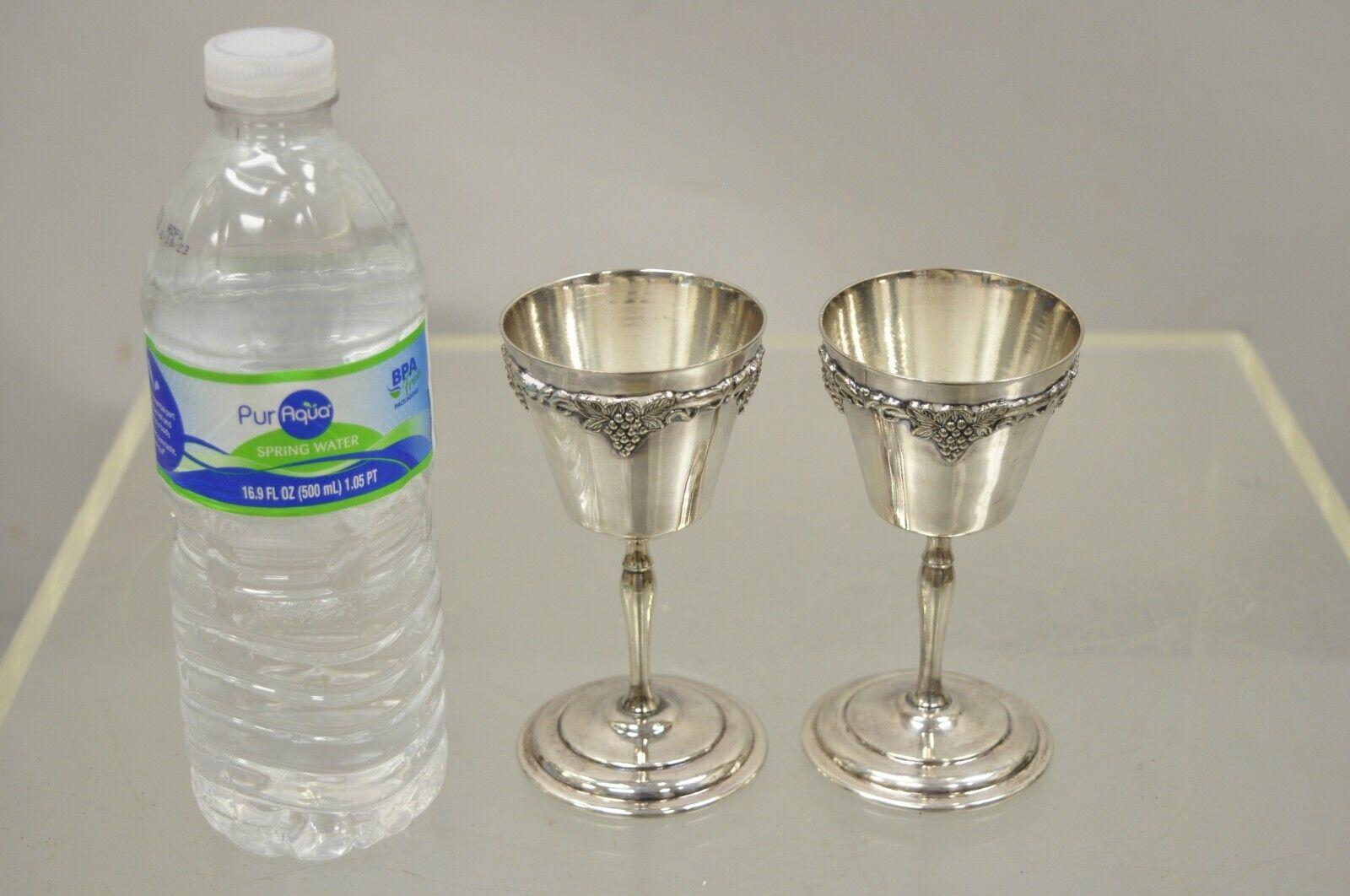Antique Old English Repro Silver Plated Sherry Wine Liquor Goblet Cups Set of 2. Item features grape and vine details, original stamp, very nice antique pair, quality craftsmanship, great style and form. Circa Early 1900s. Measurements: 4.75