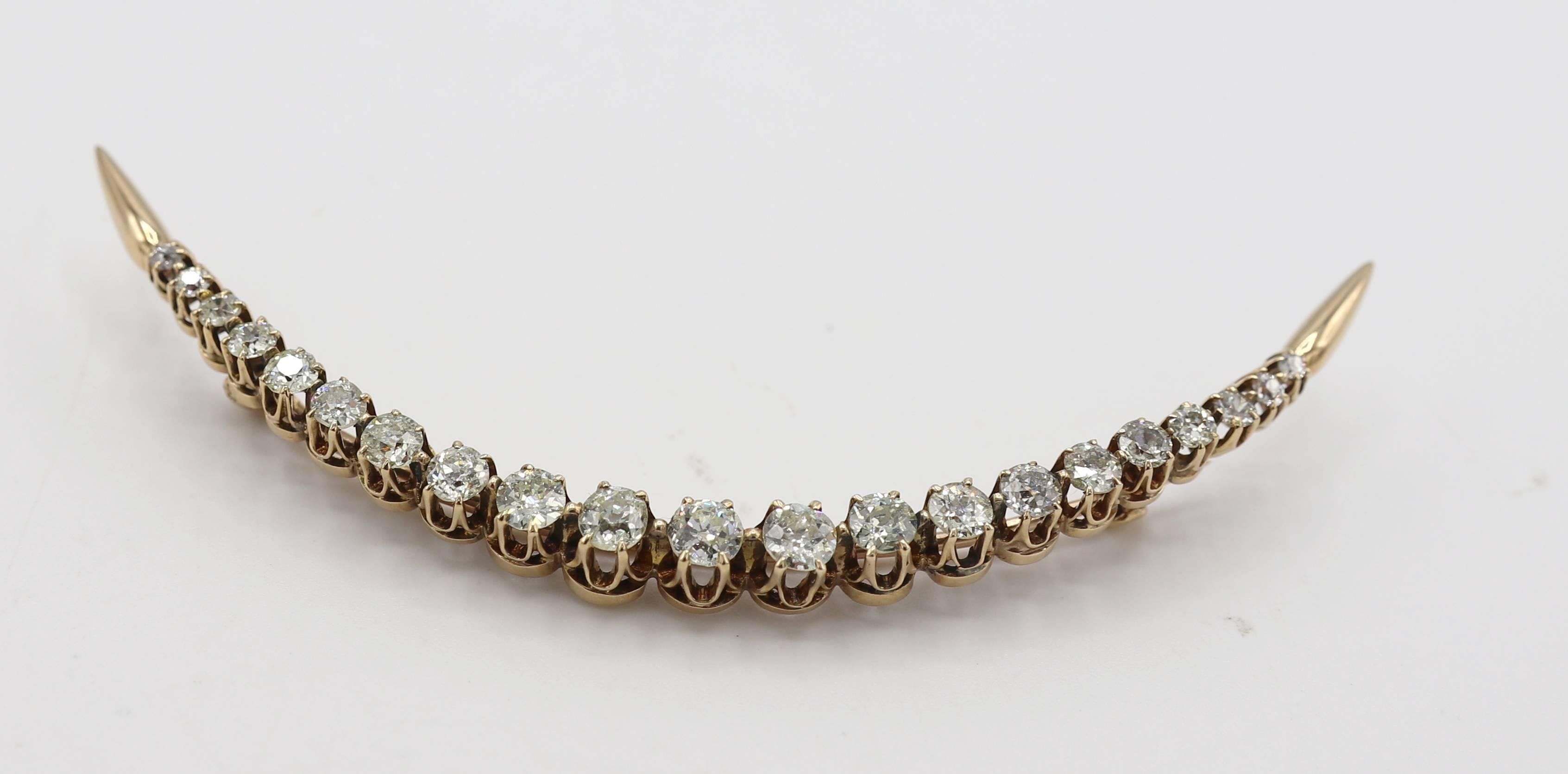 Antique Old European and Mine Cut Diamond Large Crescent Pin Brooch 
Metal: 14k yellow gold
Weight: 8.44 grams
Diamonds: Approx. 2.25 CTW old European & mine cut diamonds L-M SI
Length: 3.25 inches
