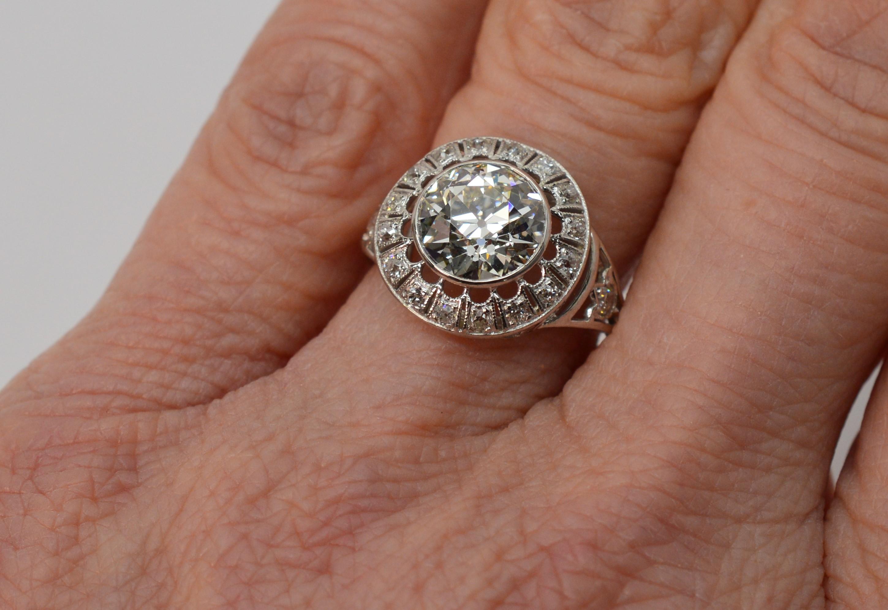 Exquisite antique Old European brilliant cut 2.25 carat diamond ring presents as an outstanding engagement ring or extraordinary personal fine jewelry piece for that special someone. 
The elegant Edwardian style setting in platinum beautifully hosts
