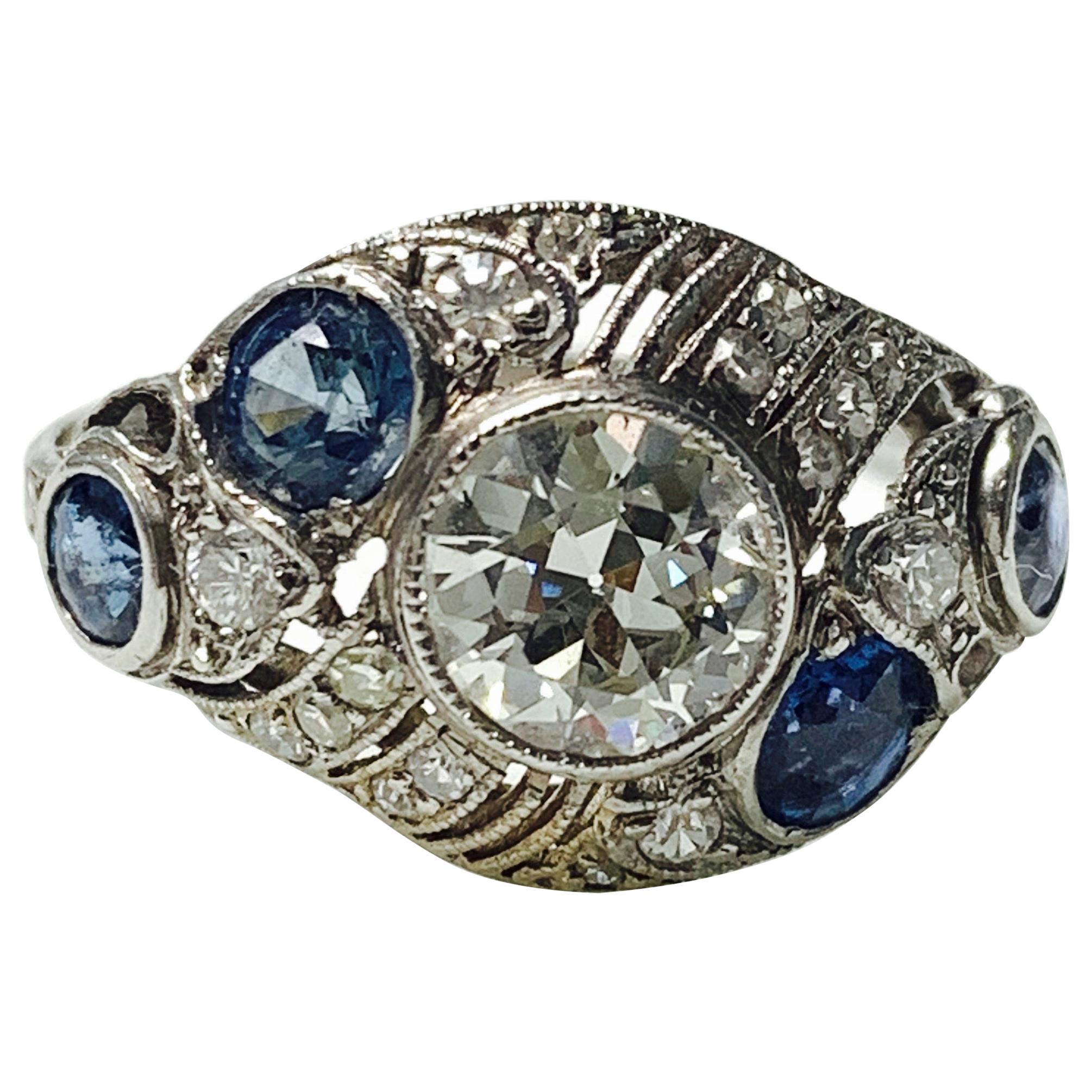 Antique Old European Cut Diamond and Blue Sapphire Ring in Platinum For Sale