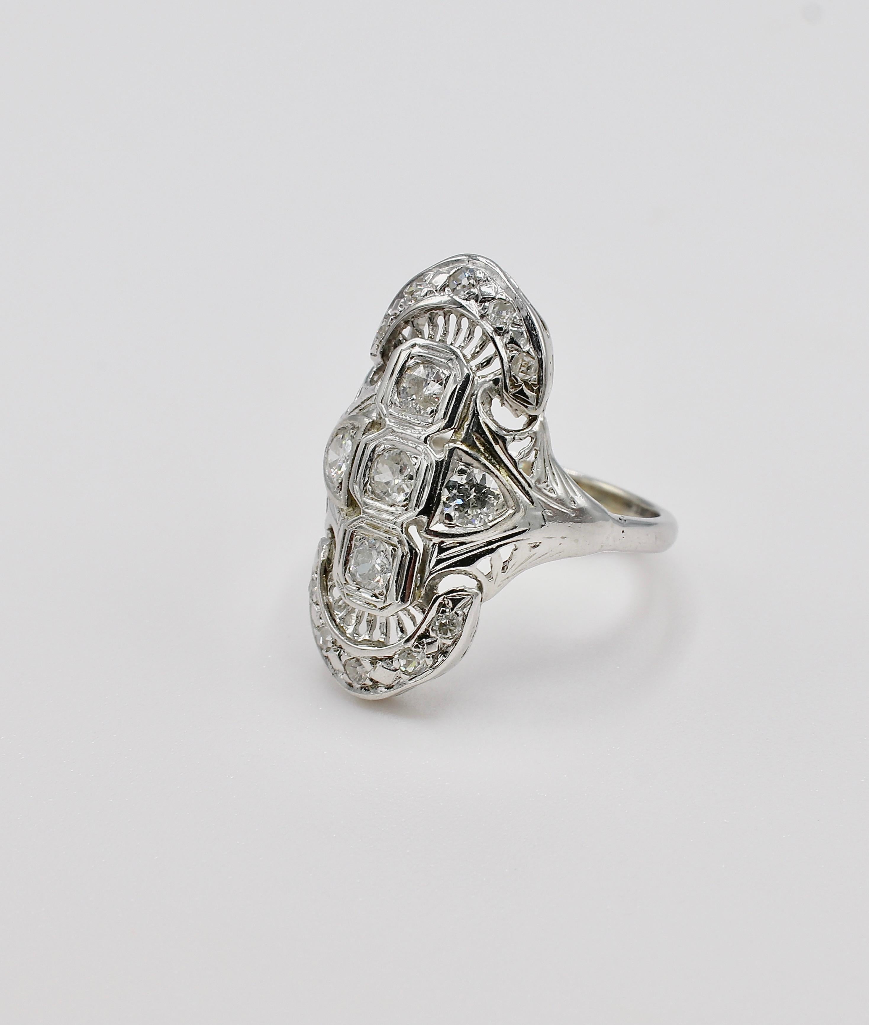 Antiker alter europäischer Schliff natürlicher Diamant Navette 14K Weißgold Cocktail Ring Größe 5.75

Metall: 14K Weißgold
Gewicht: 3,7 Gramm
Diamanten: Ca. .50 CTW alte europäische Diamanten und natürliche Diamanten im Einzelschliff H-I SI 
Die
