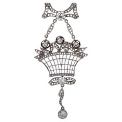 Antike Halskette mit Diamant-Anhänger mit Schleifenmotiv im alteuropäischen Schliff, Platin