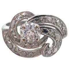 Bague tourbillon ancienne en or blanc 14 carats avec diamants taille vieille Europe