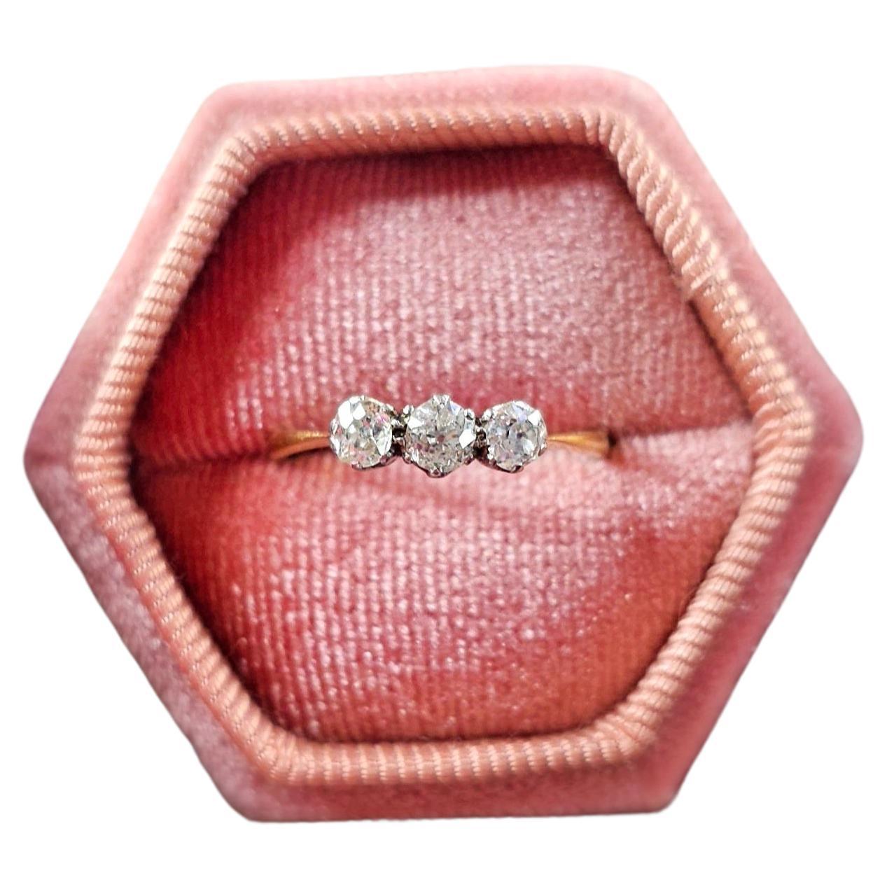 Transport yourself to an era of timeless elegance with our Vintage Old Cut Diamond Trilogy Ring—a mesmerizing piece that exudes charm and character.  

Old cut diamonds are highly prized and sought after.  Before advancements in diamond cutting,